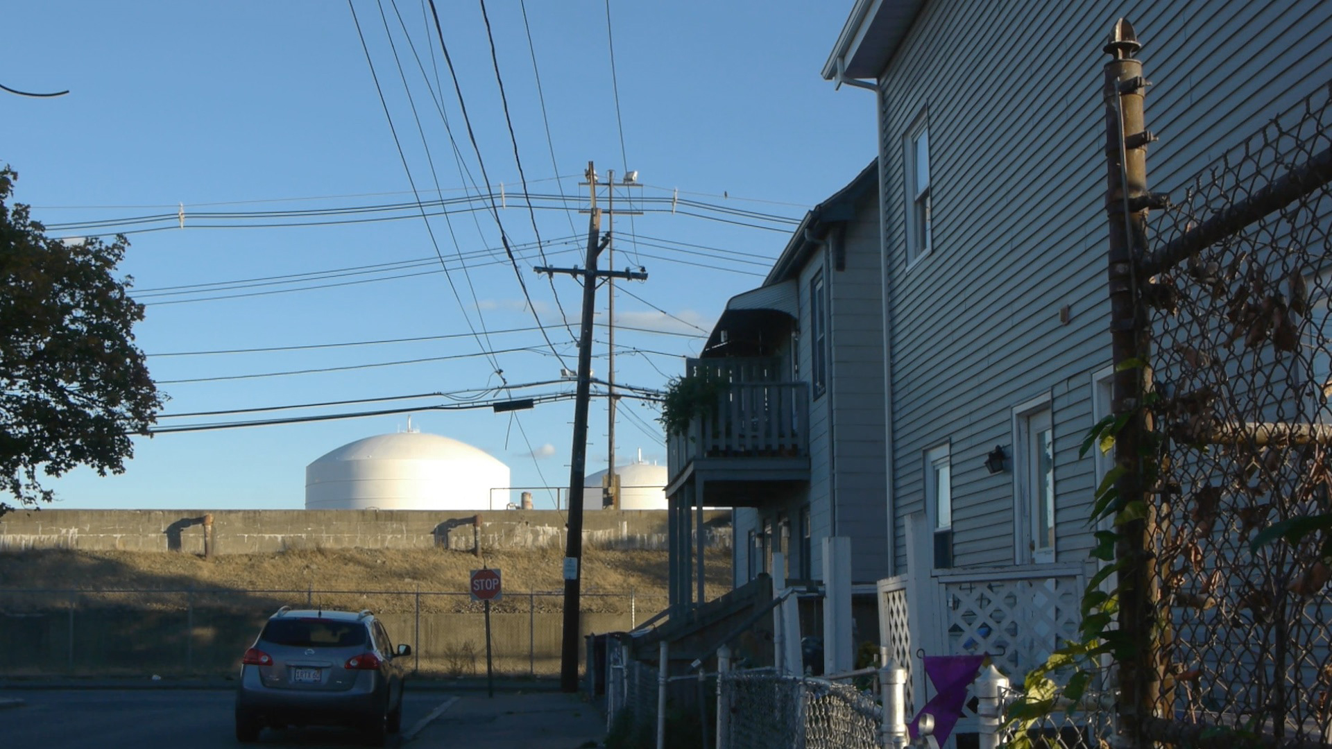 LNG storage tanks seen from Robin Street in the Lynde.
