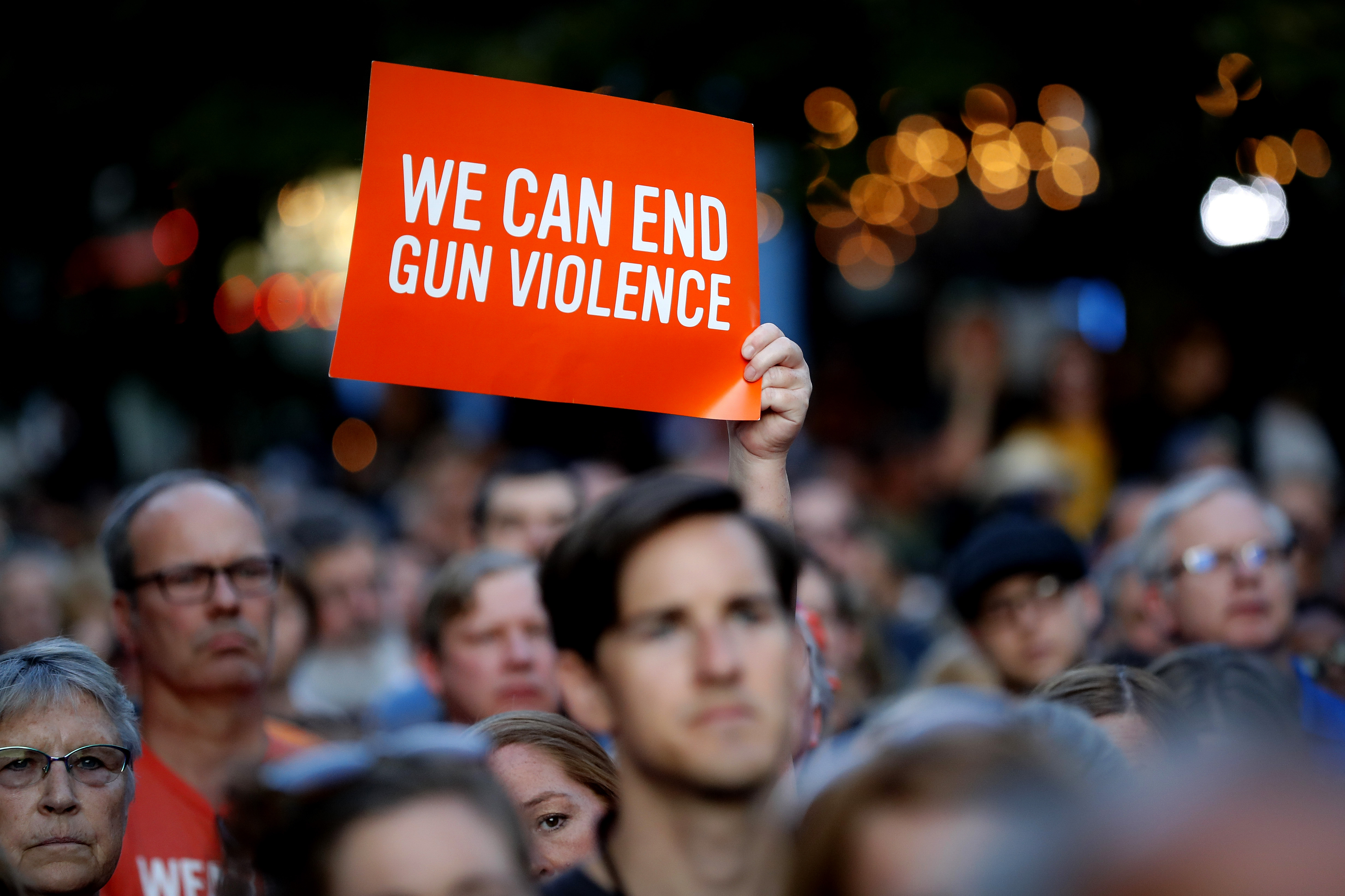 Mourners gathered for a vigil at the scene of a mass shooting in Dayton, Ohio.