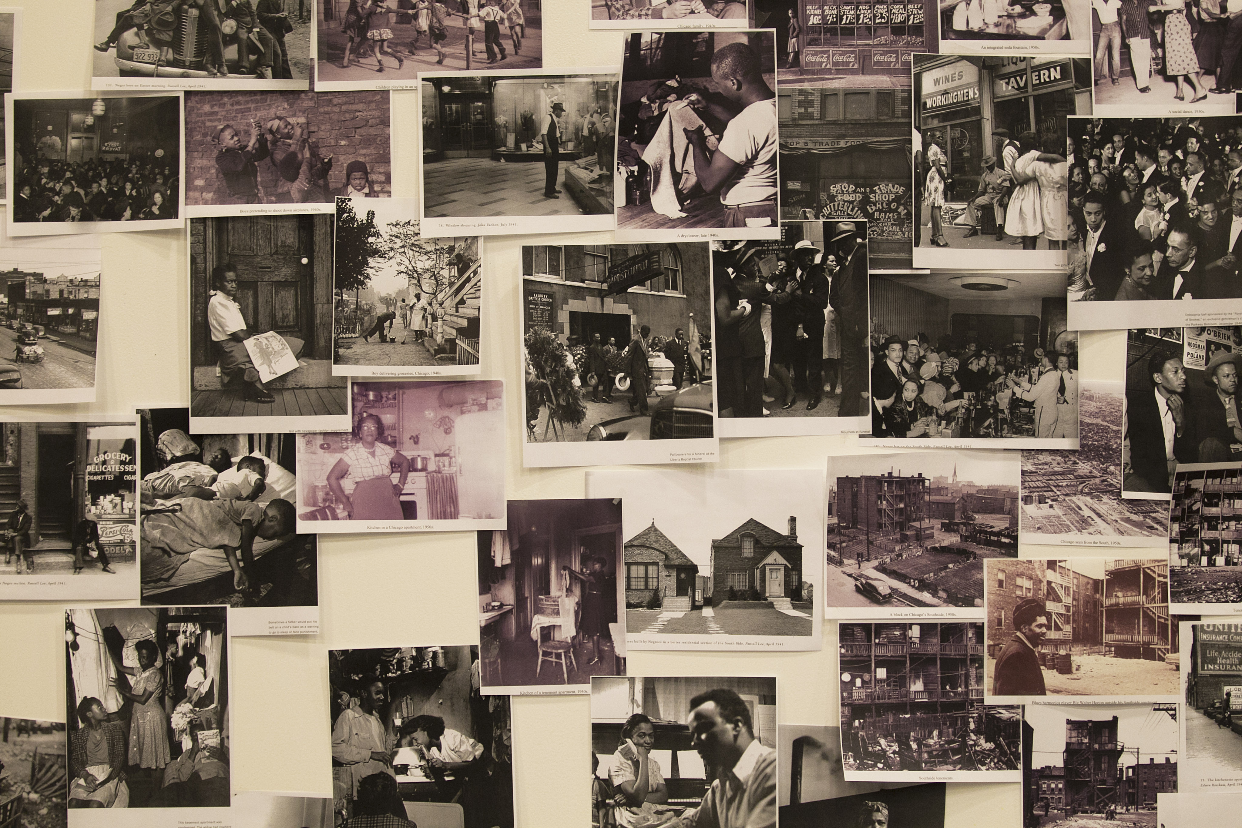 A research wall of photographs from the era of “A Raisin in the Sun” hangs in the Huntington Theatre Company’s rehearsal space, where actors can study the images.
