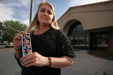 Valerie Bruno holds a photo of her three daughters outside the Carbon County Court Complex in Price, June 6, 2012. Bruno said she has filed a complaint with the Utah Judicial Conduct Commission against 7th District Juvenile Court Judge Scott Johansen for telling her to cut off her daughter’s ponytail in court if she didn’t want the 13-year-old to serve 276 hours of community service.