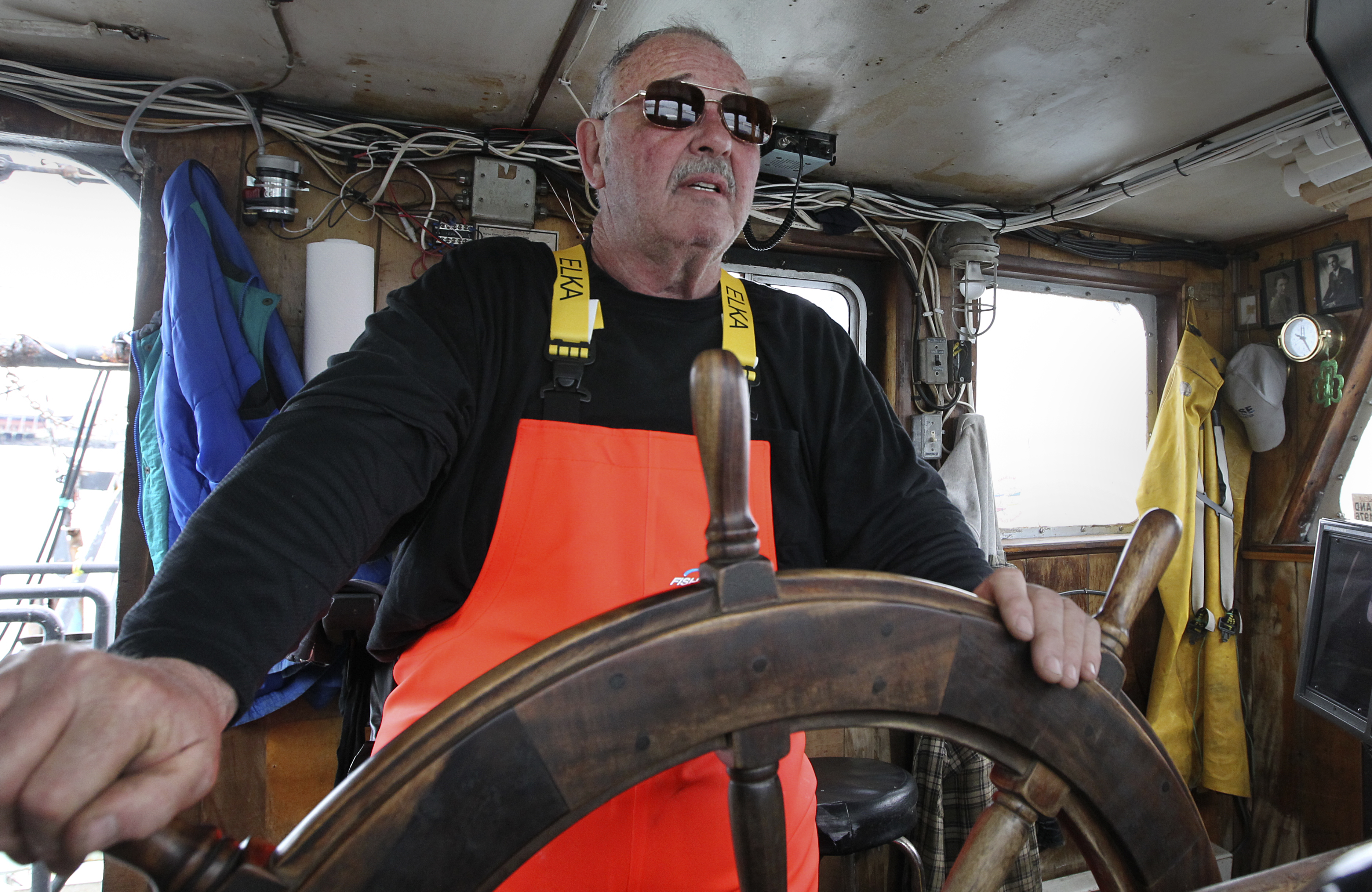 Russell Sherman pilots into Gloucester to unload his catch.