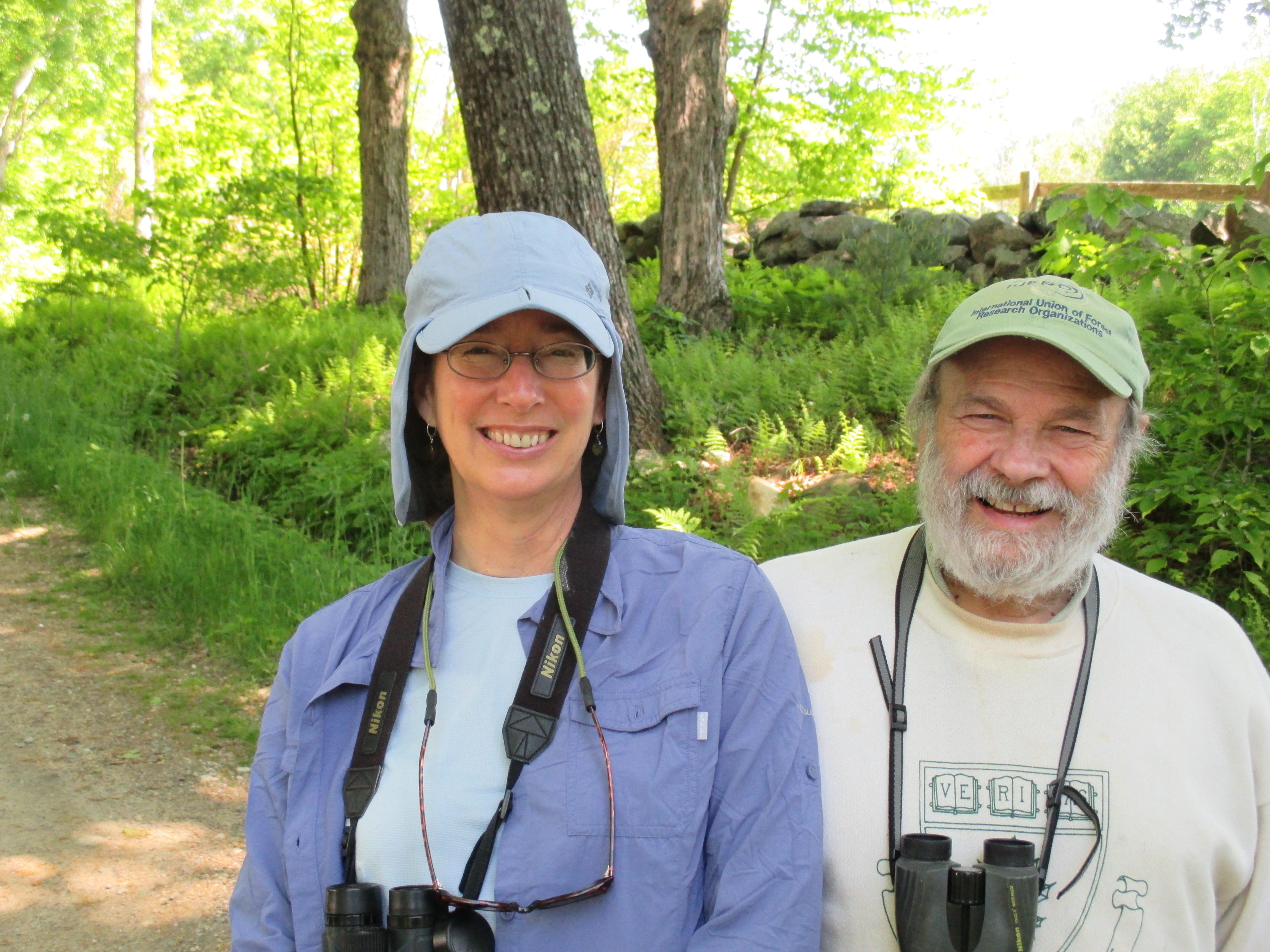 Biologist John O’Keefe (left, with Lynda V. Mapes) has studied the same 50 trees for 25 years.