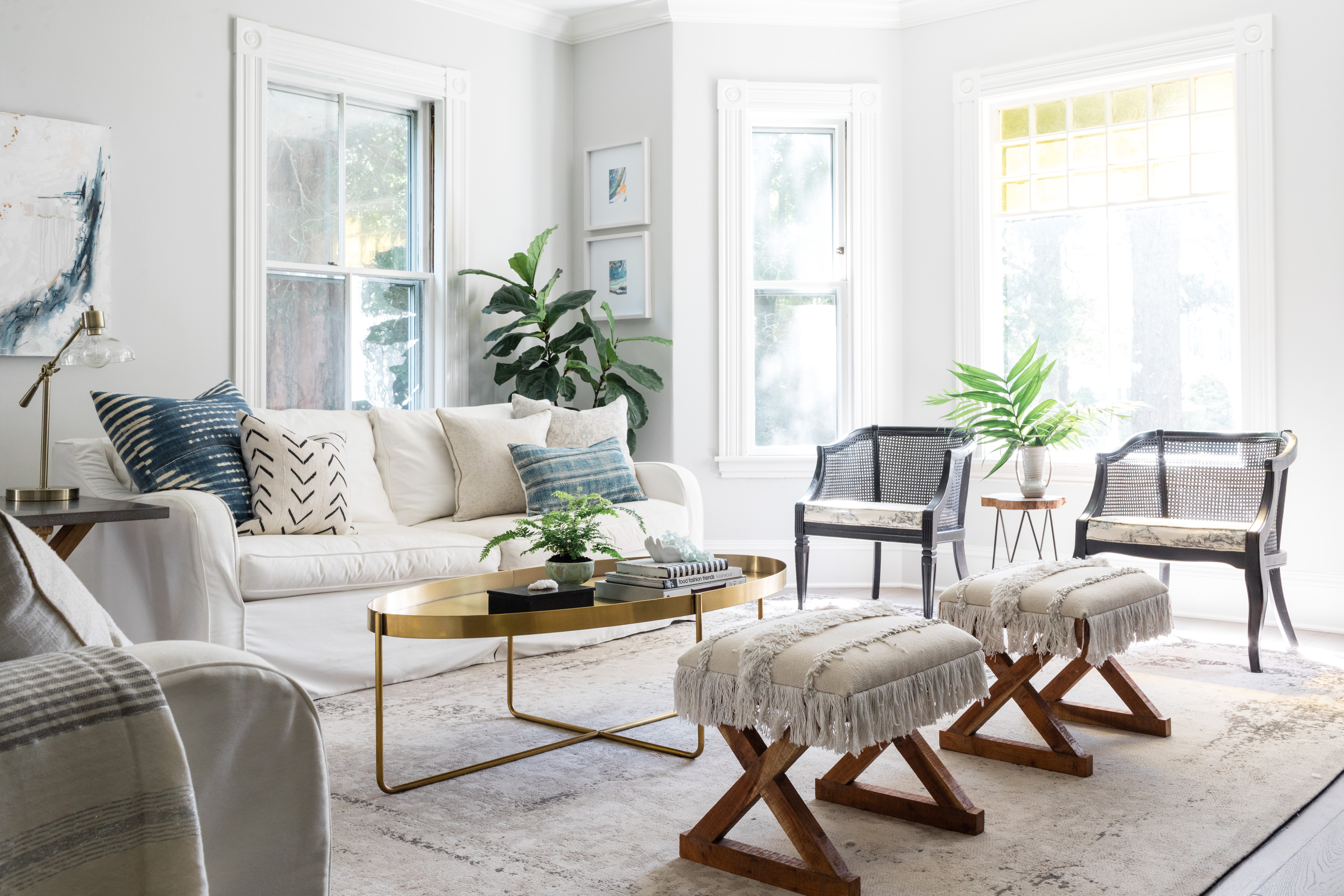 Minns designed the living room around the cane chairs, which she inherited from her acupuncturist in San Diego. The rug, an inexpensive online purchase, reflects the designer’s family-friendly approach. “I’m a mom first,” she says.