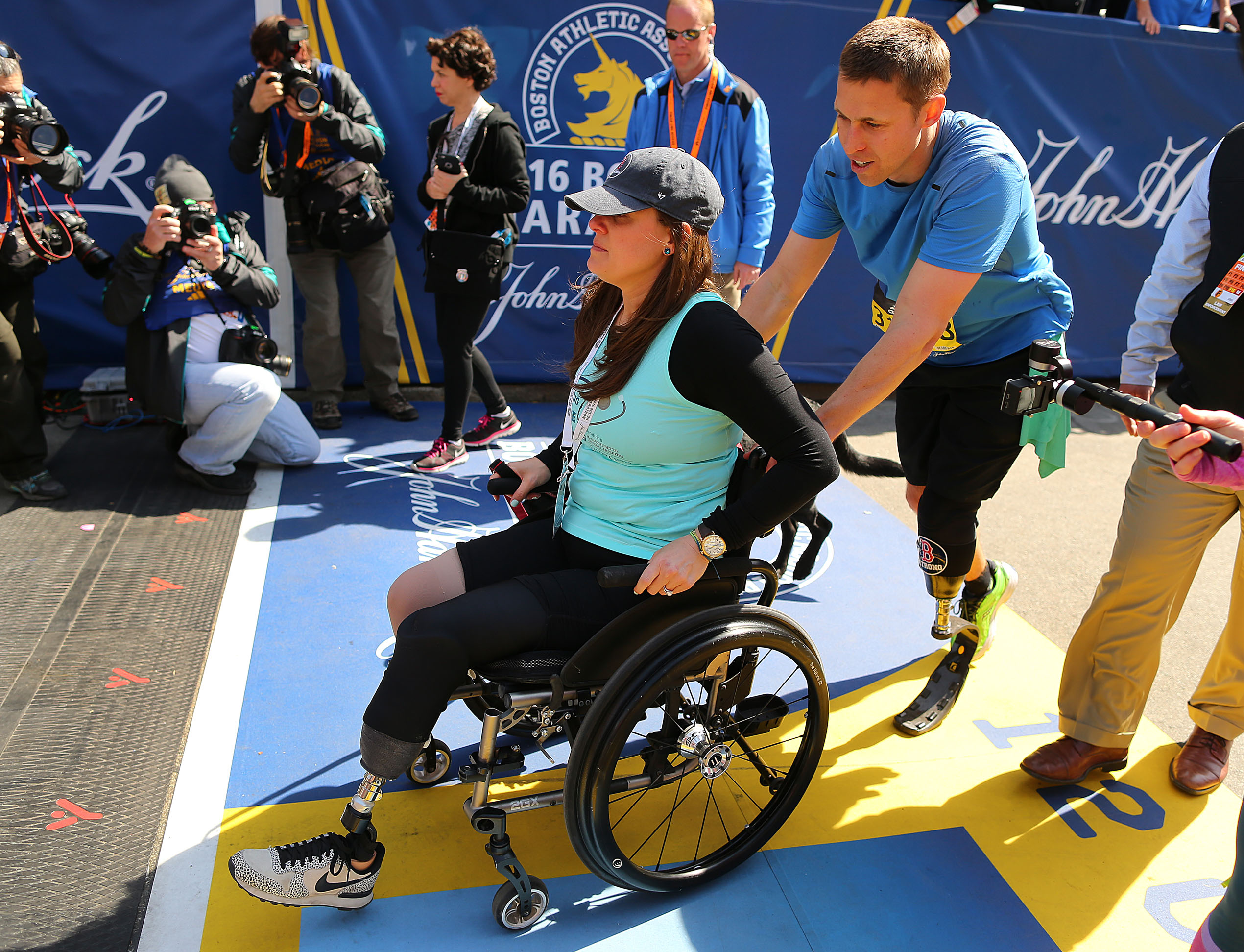 Patrick Downes was met at the finish line by Jess Kensky, his wife.