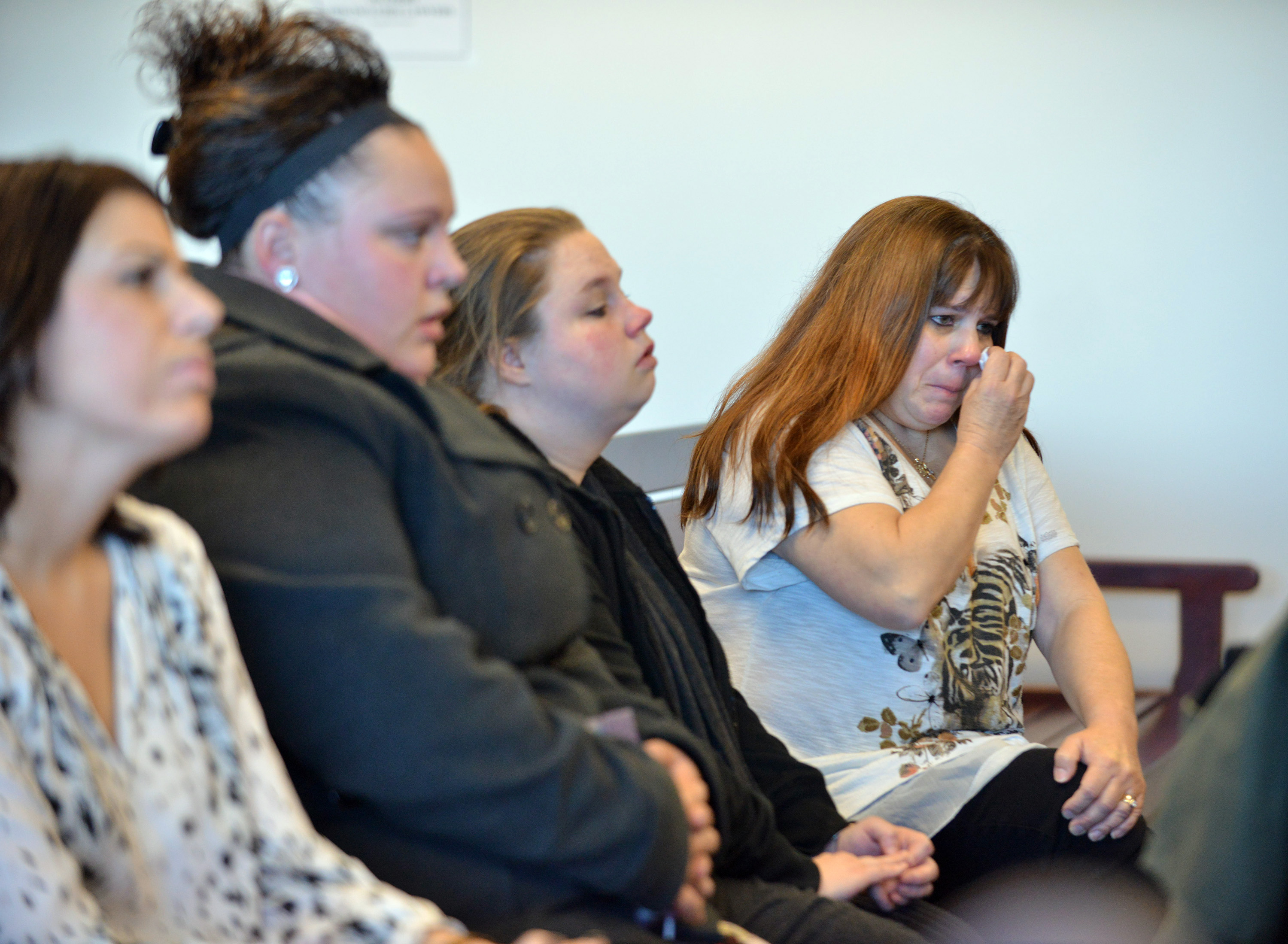The grandmother of infant William Berry (right) reacted to a description of the child's death in court.