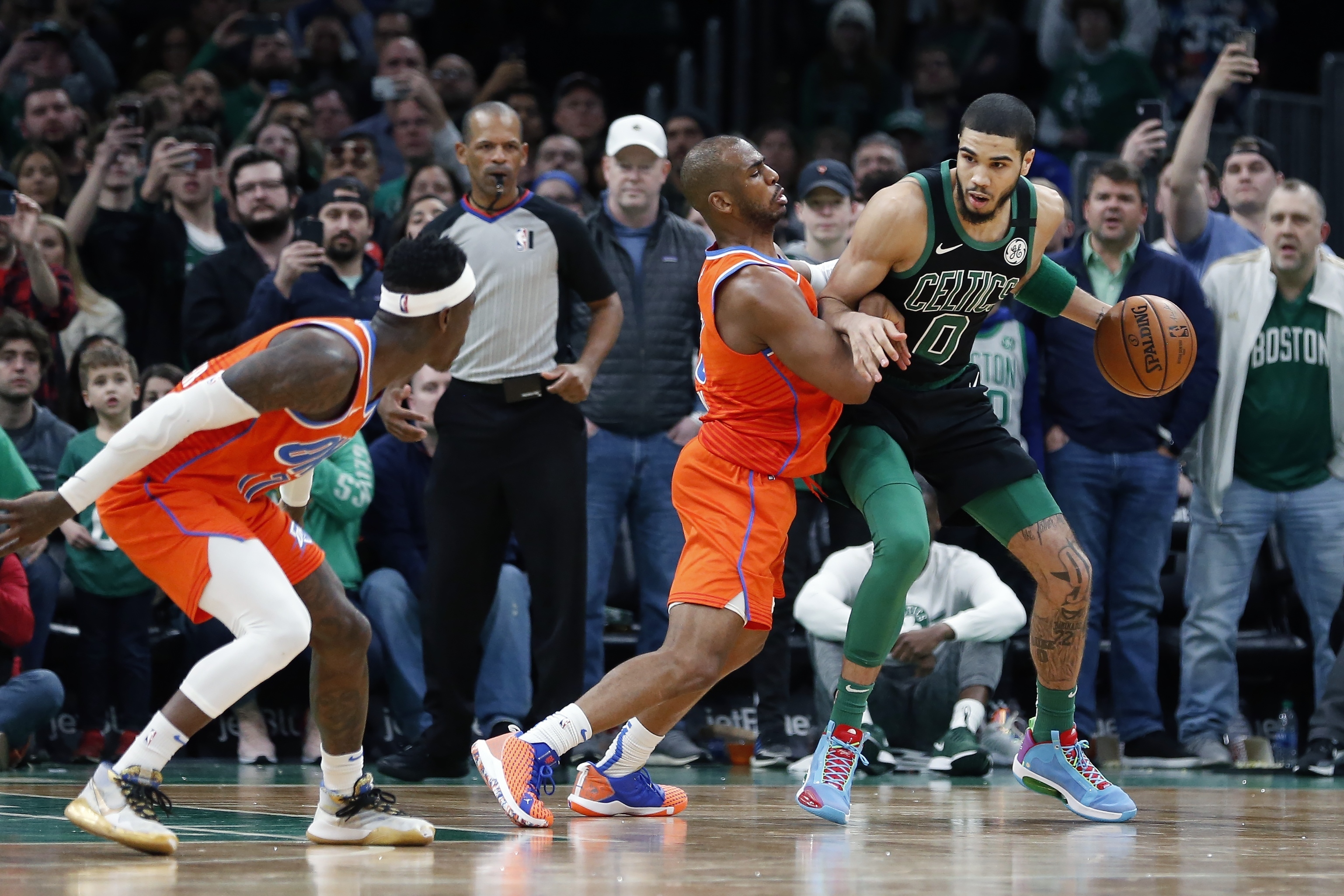 Chris Paul defends against Jayson Tatum late Sunday's game.