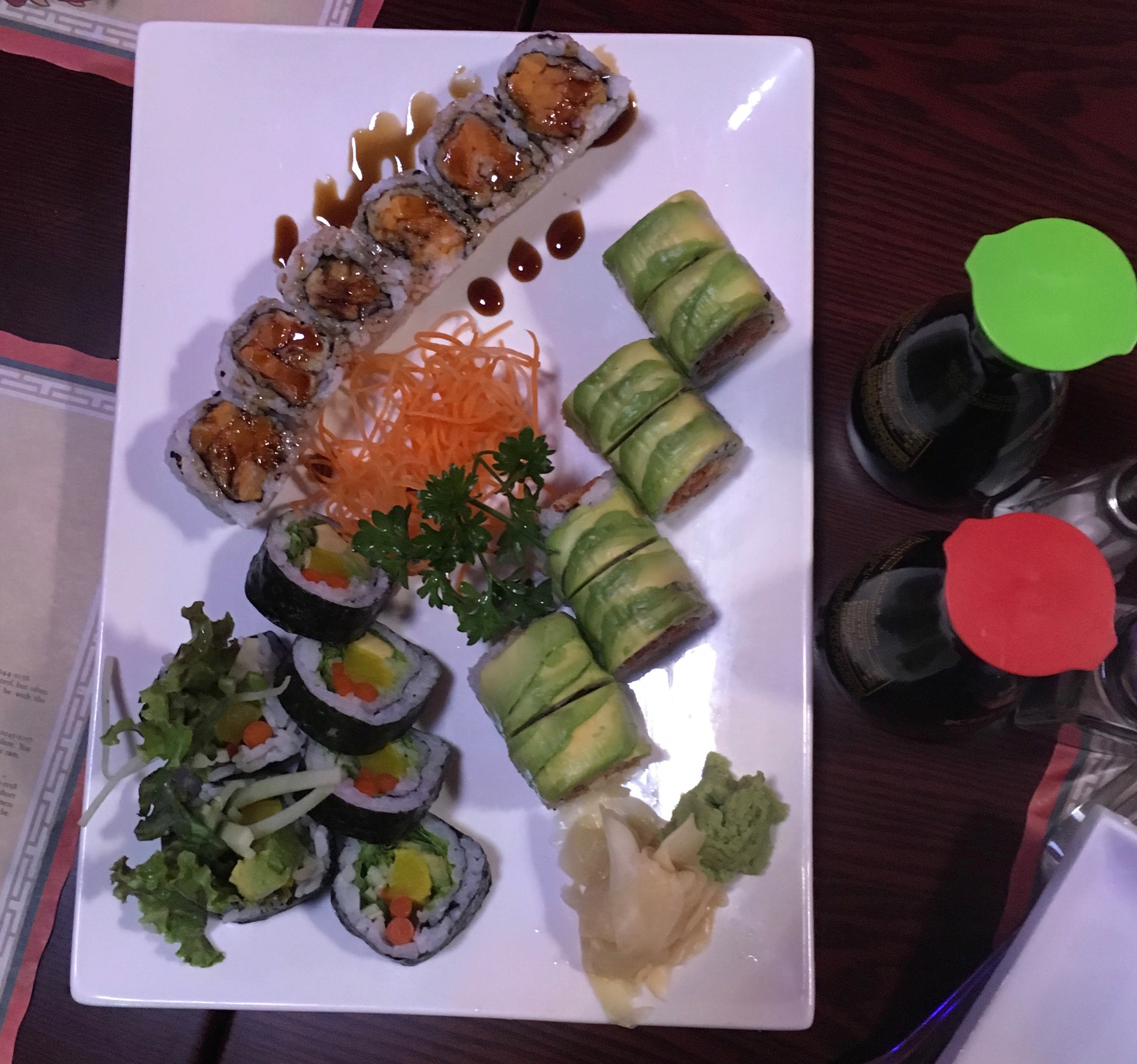 A platter of Nagoya's caterpillar roll, sweet potato roll, and vegetable roll.