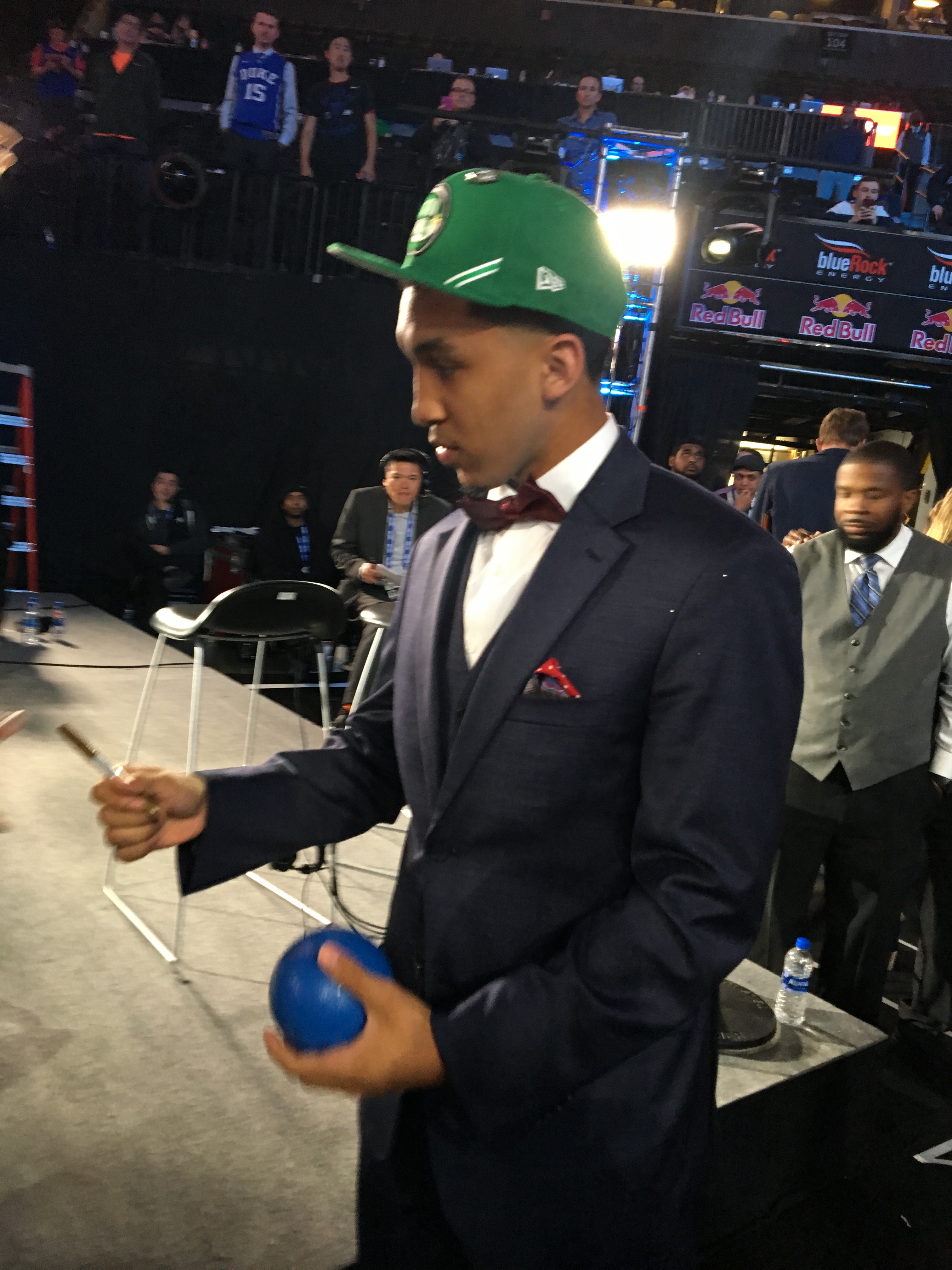 Tremont Waters signs a spongy basketball after his moment on stage at the Barclays Center.