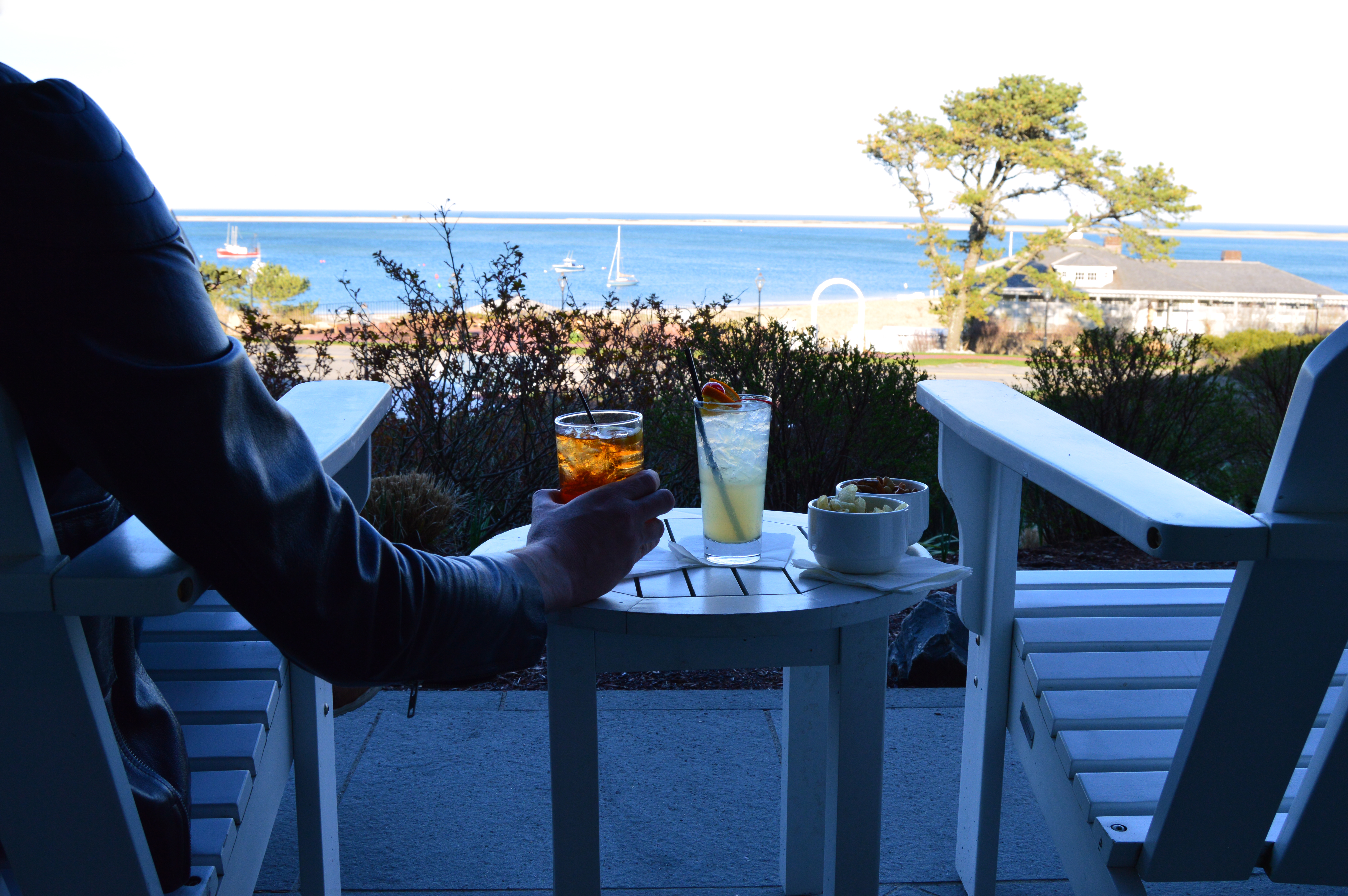 With cocktail or coffee in hand, guests can enjoy the oceanside view from the front porch of the Chatham Bars Inn, which celebrates its 100th anniversary in 2014.