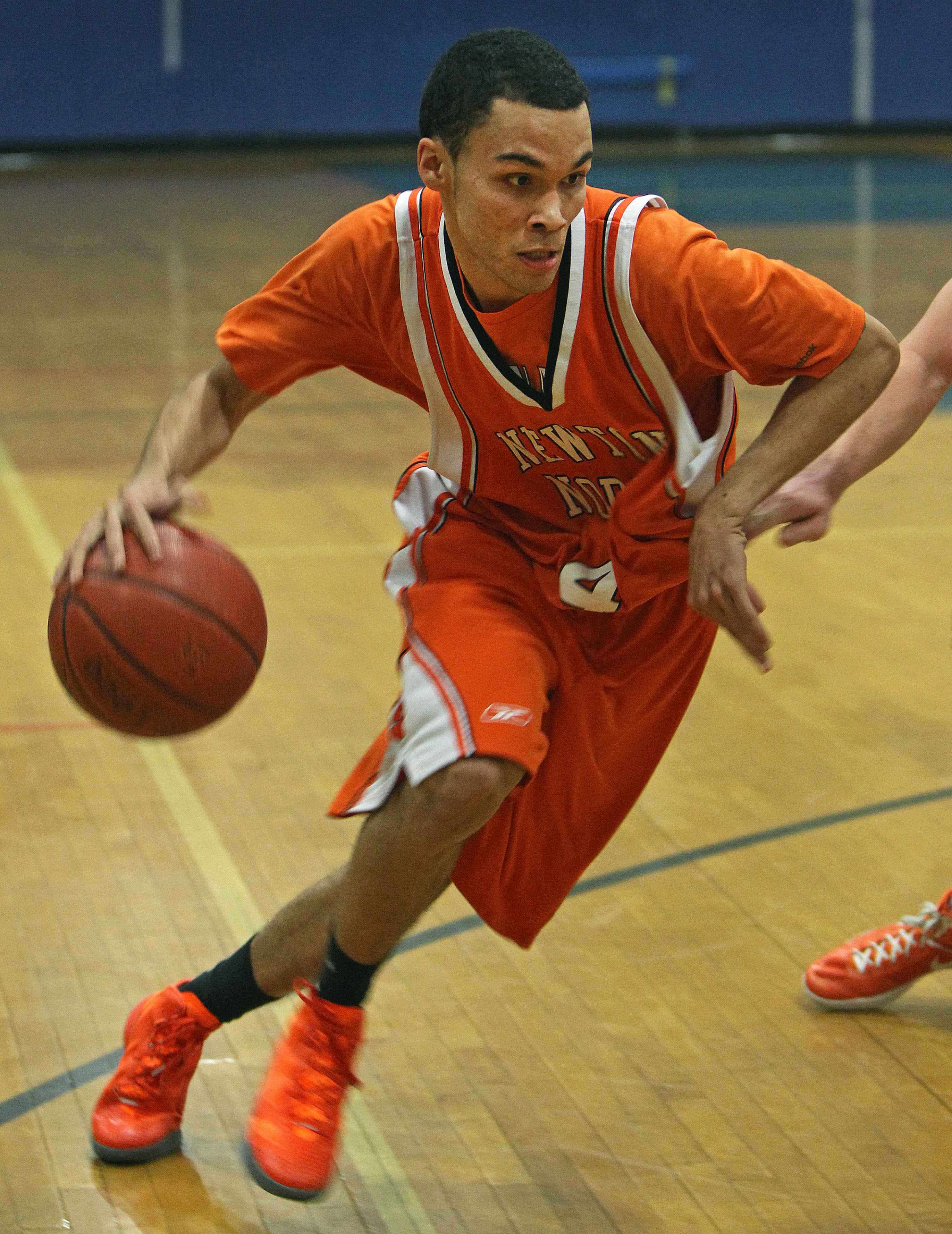 Newton North's Michael Thorpe is pictured in action in a game between Newton North and Walpole High.