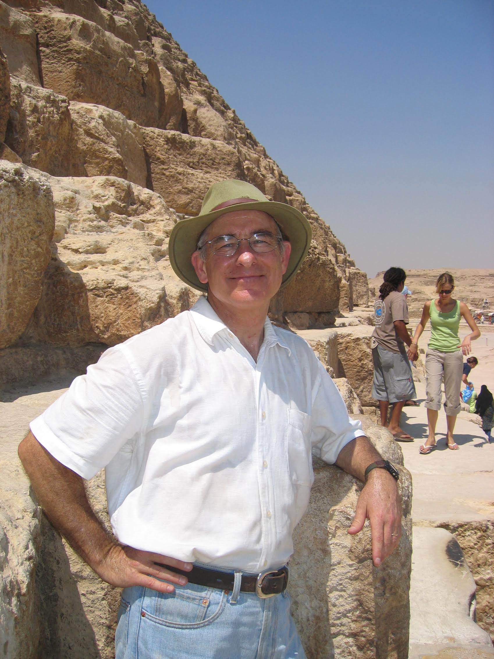 Mark Lehner leaning on the Great Pyramid