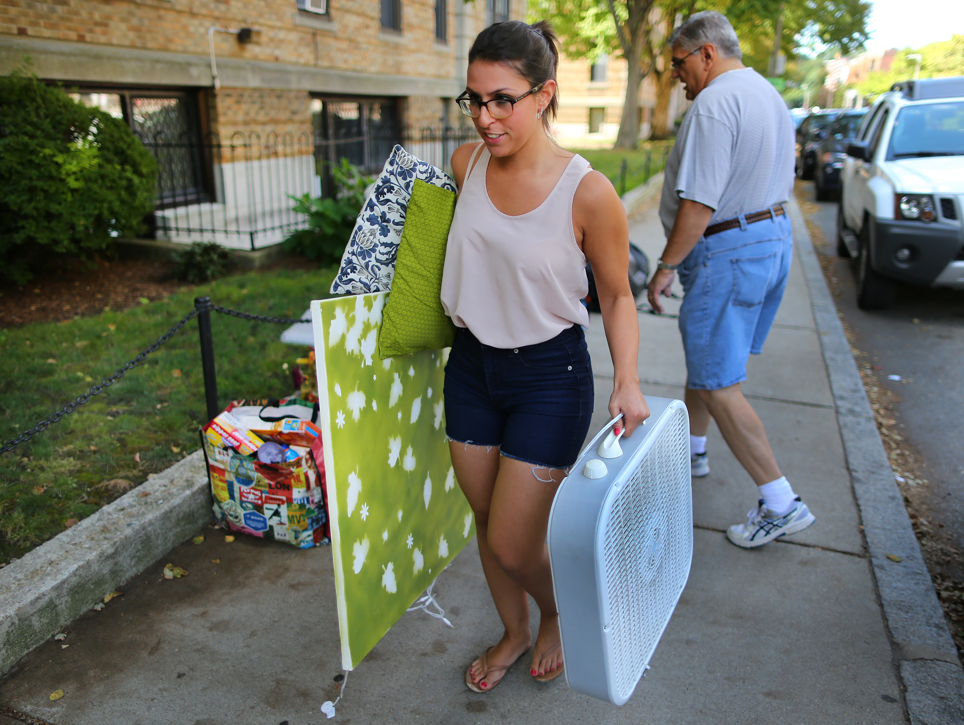 Ali Pappianne, a BU junior, got help from her dad moving into an apartment on Buswell Street.