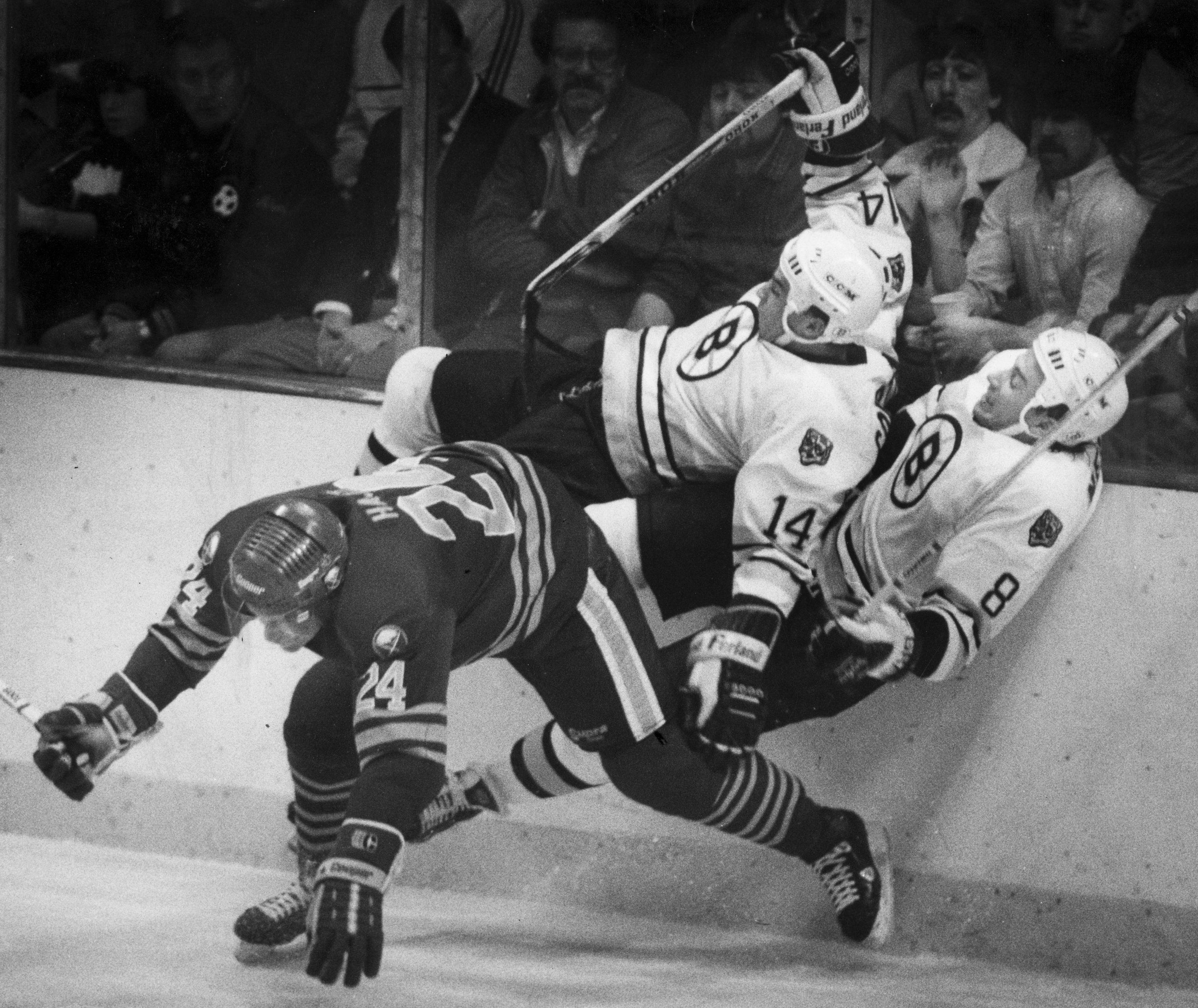 Geoff Cournall (center) played for the Bruins from 1983 to 1988 while Cam Neely (right) played in Boston from 1986 to 1996.