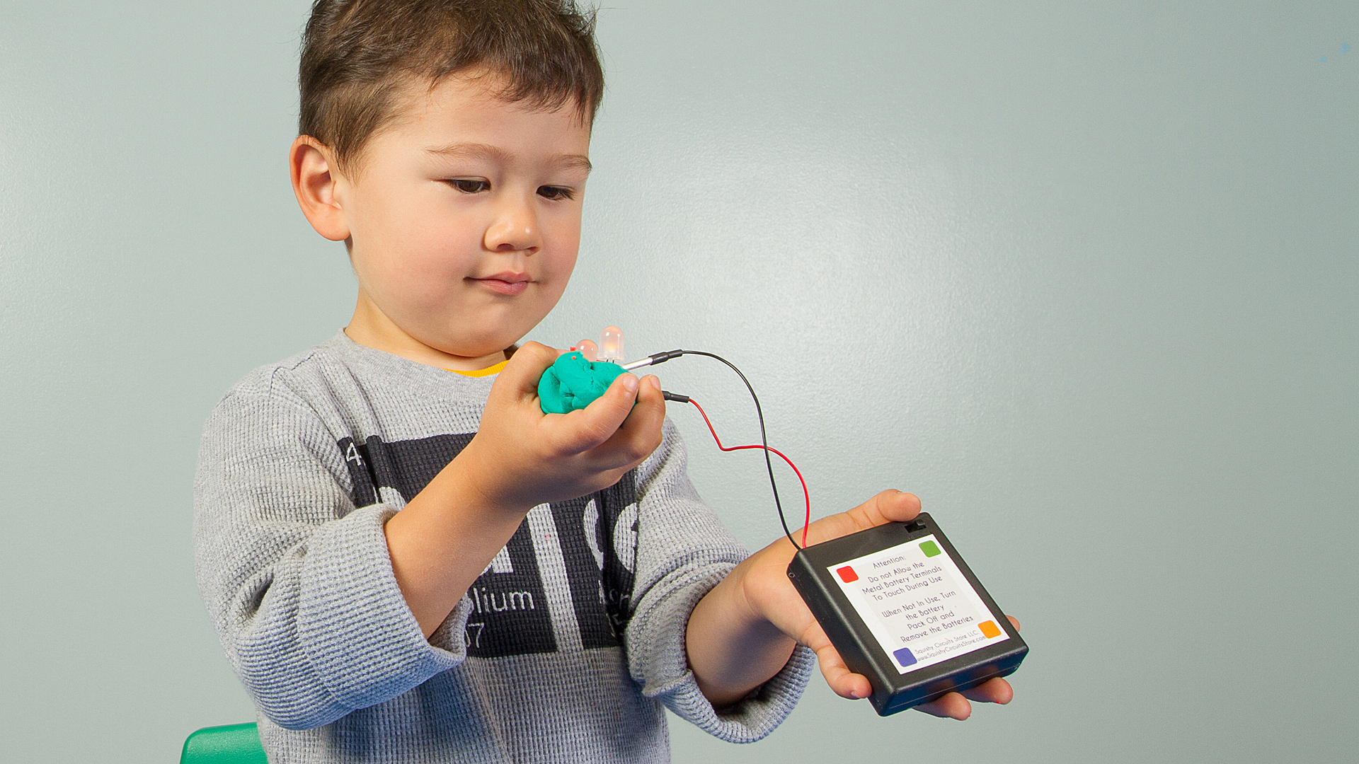 Seattle’s Pacific Science Center has created a new Curiosity at Home online resource for kids that includes streaming live science shows, hands-on STEM activities, tutorials, interviews with scientists, and a chance to connect with experts in real-time and ask questions. Here, a child works with a squishy electric circuit.