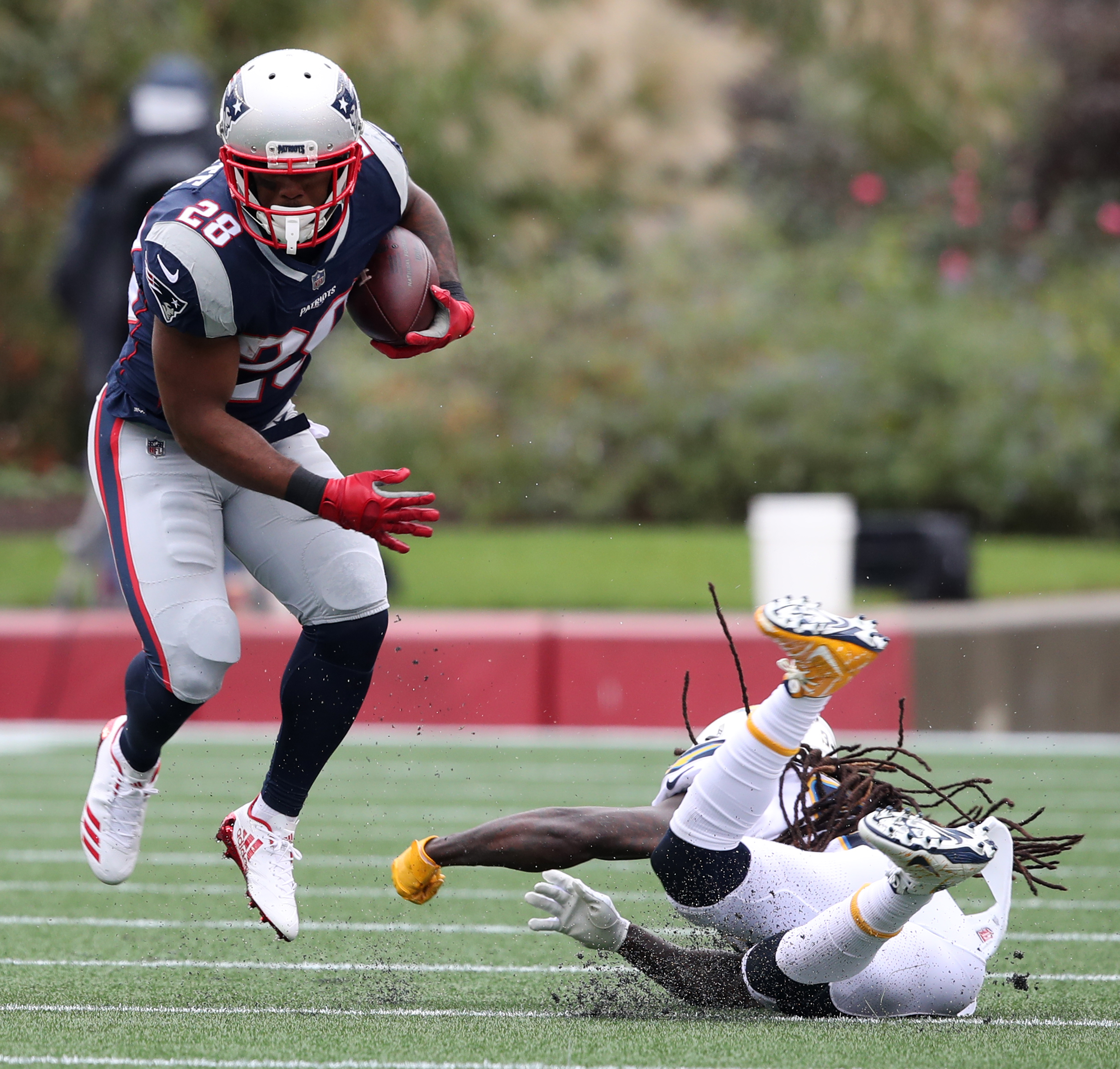 Running back James White danced past a Charger defender in the second quarter.