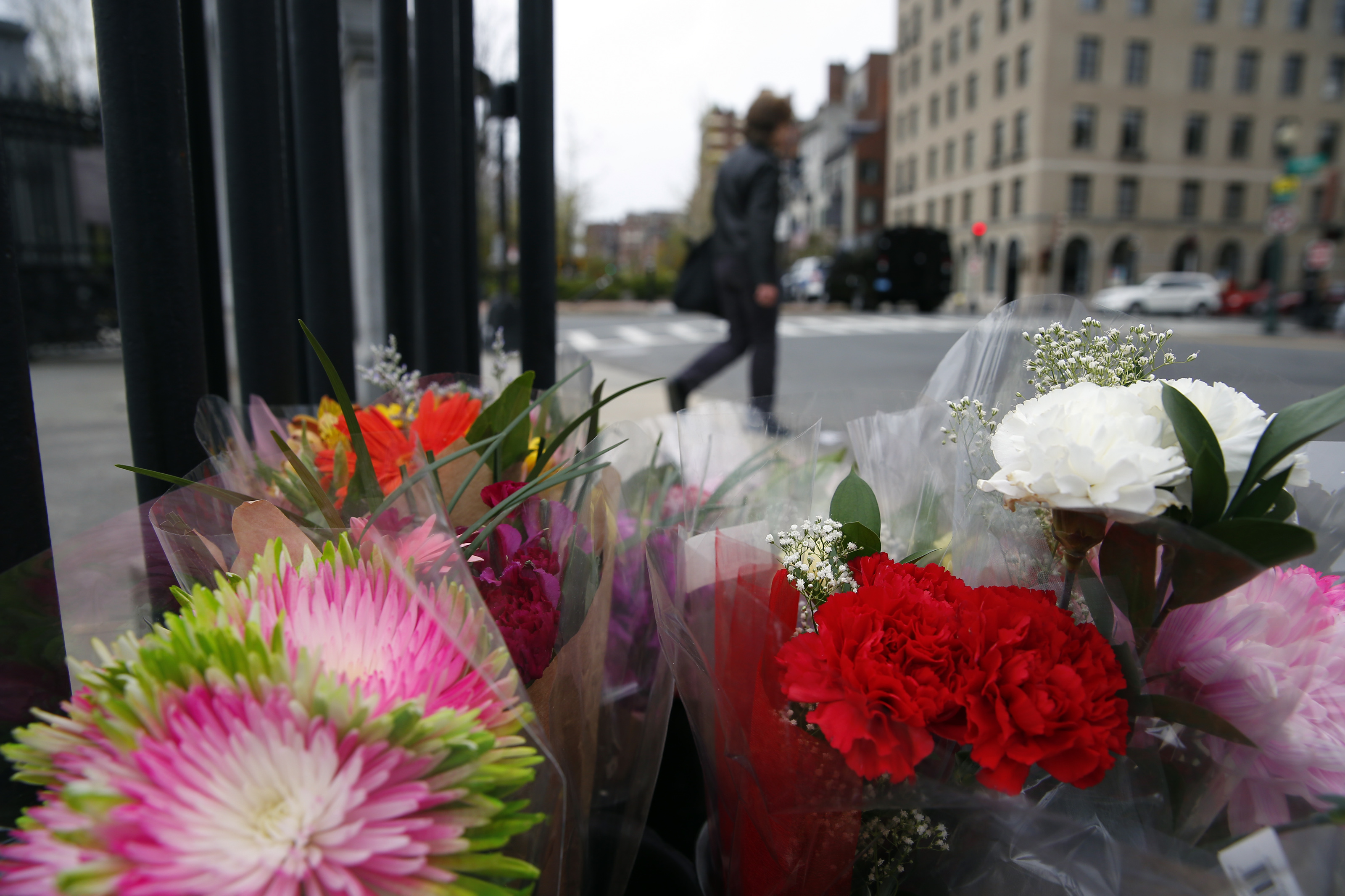 A box of flowers sat at the scene of Saturday's fatal crash involving a duck boat and a woman riding a scooter in Boston.