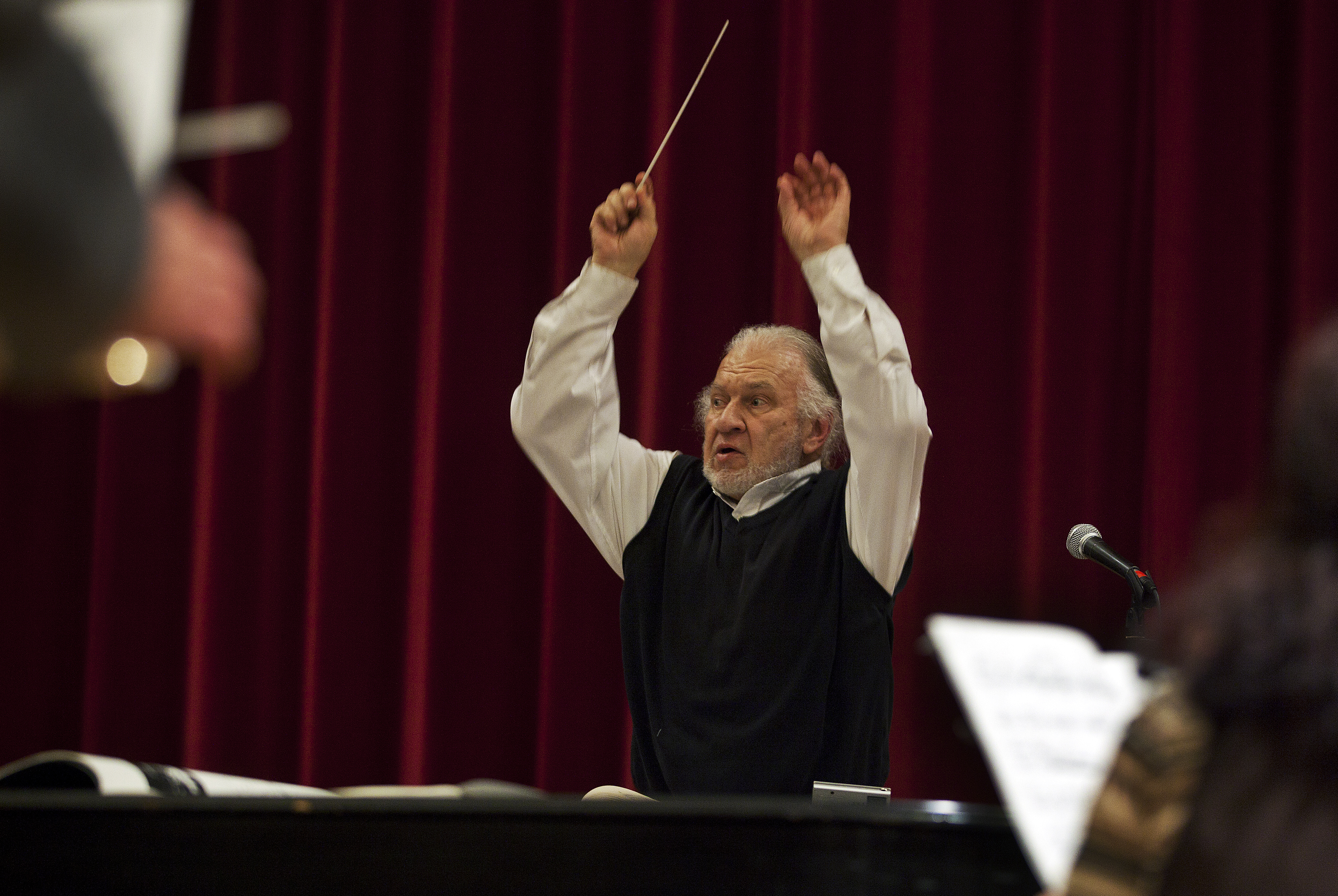 Douglas Weeks, one of three conductors, leads orchestra 2 in a rehearsal of “Gruppen.”
