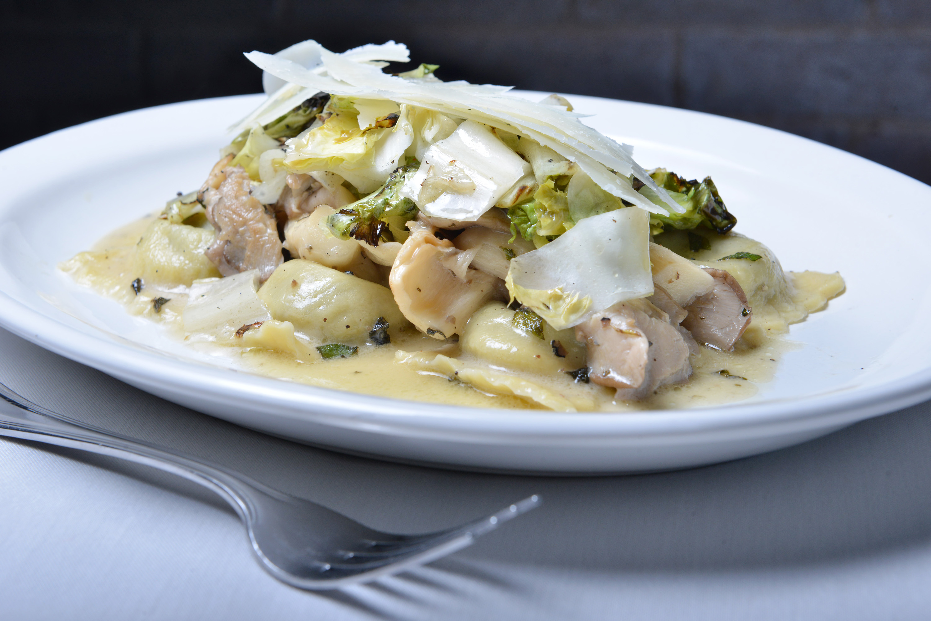 ravioli con funghi is oyster mushroom ravioli with grilled escarole
