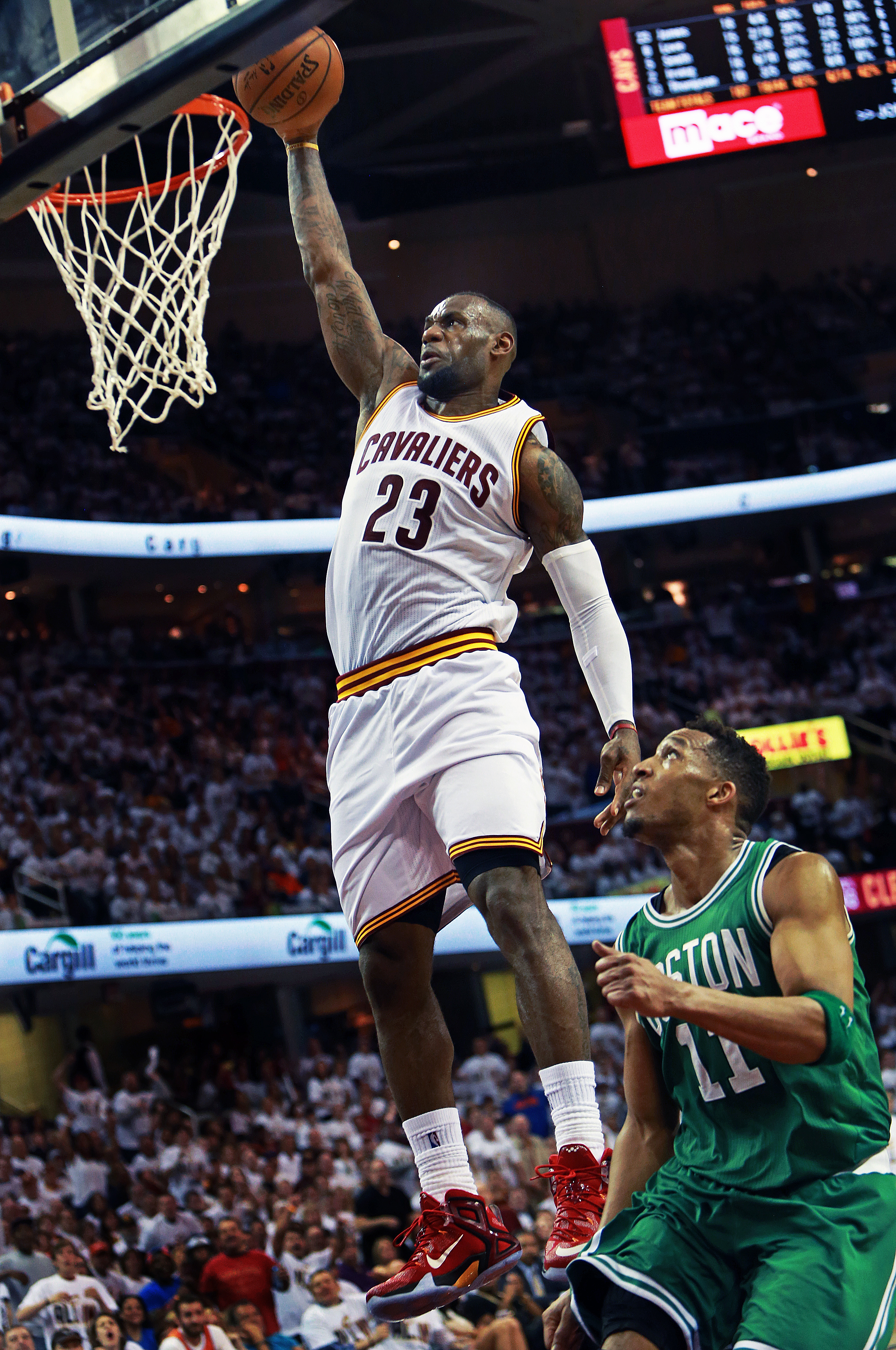 LeBron James throws down 2 of his 20 points in Game 1 against the Celtics.