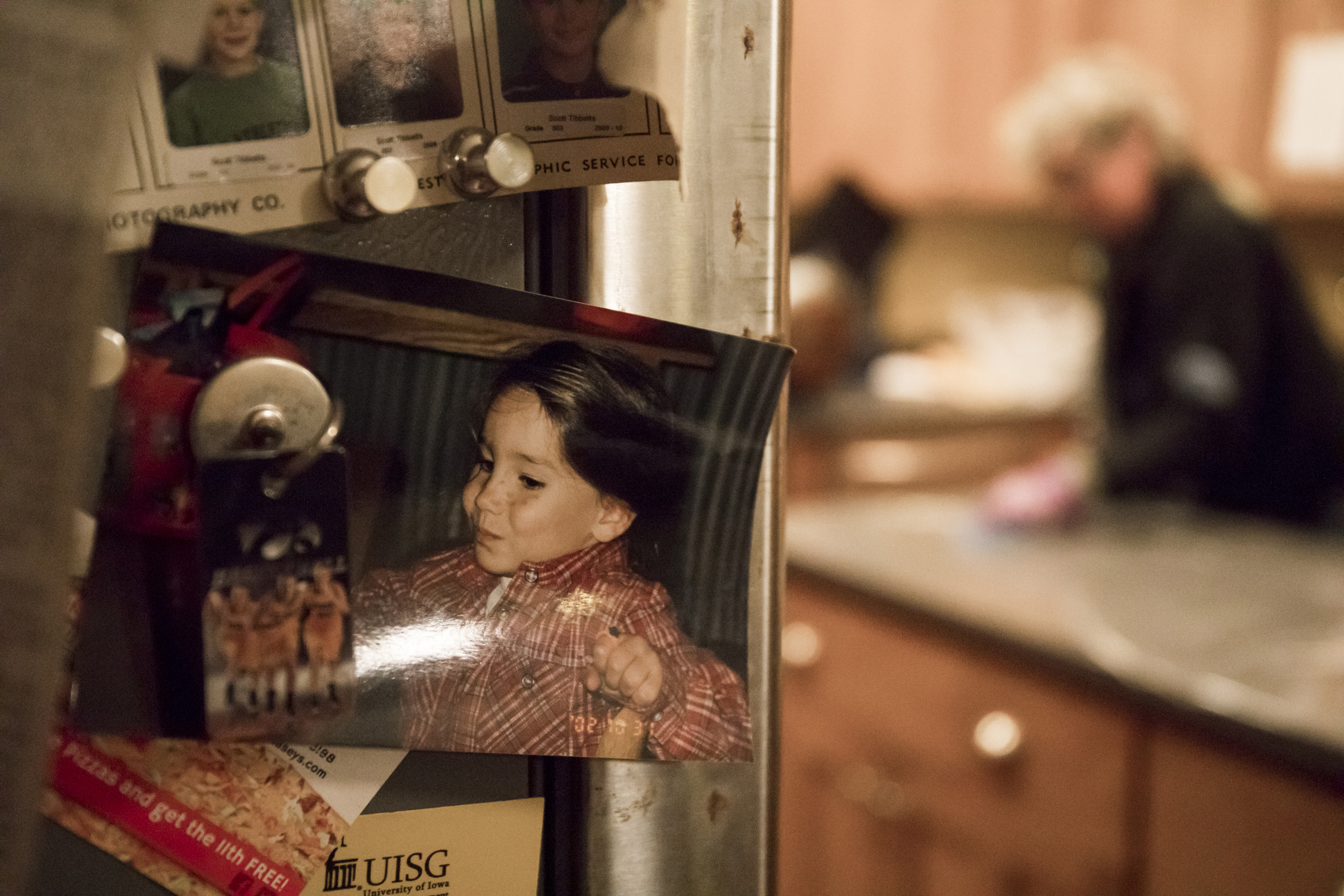 Laura Calderwood prepared dinner in her kitchen, where a childhood photo of her slain daughter Mollie hung on the refrigerator.