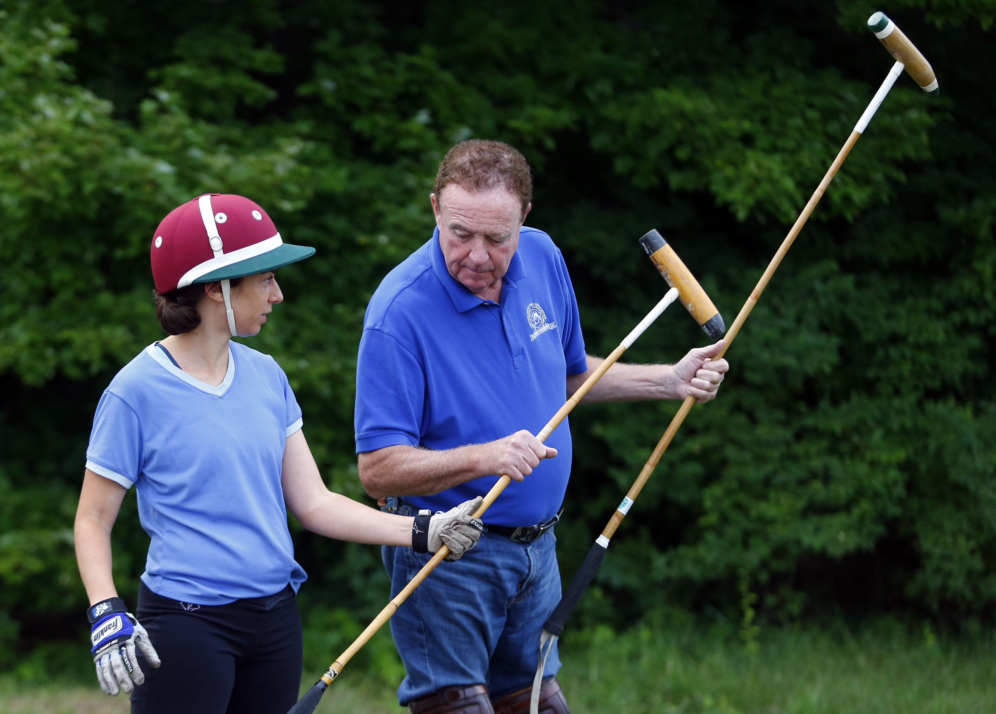 Paul Poor began Globe reporter Shira Springer’s polo lesson with a primer on the equipment.