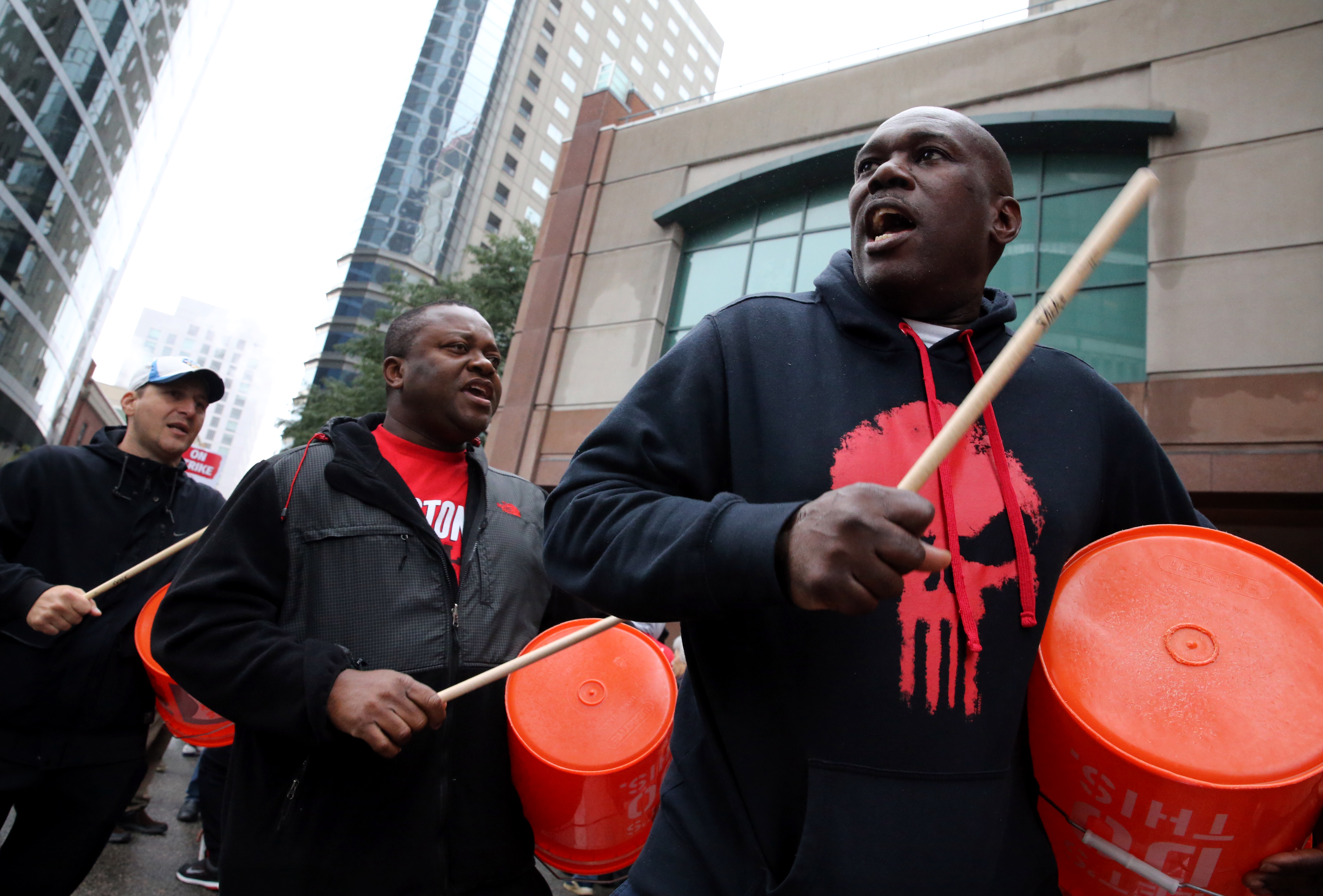 Workers and supporters picketed outside the Sheraton Boston by Marriott on Wednesday.