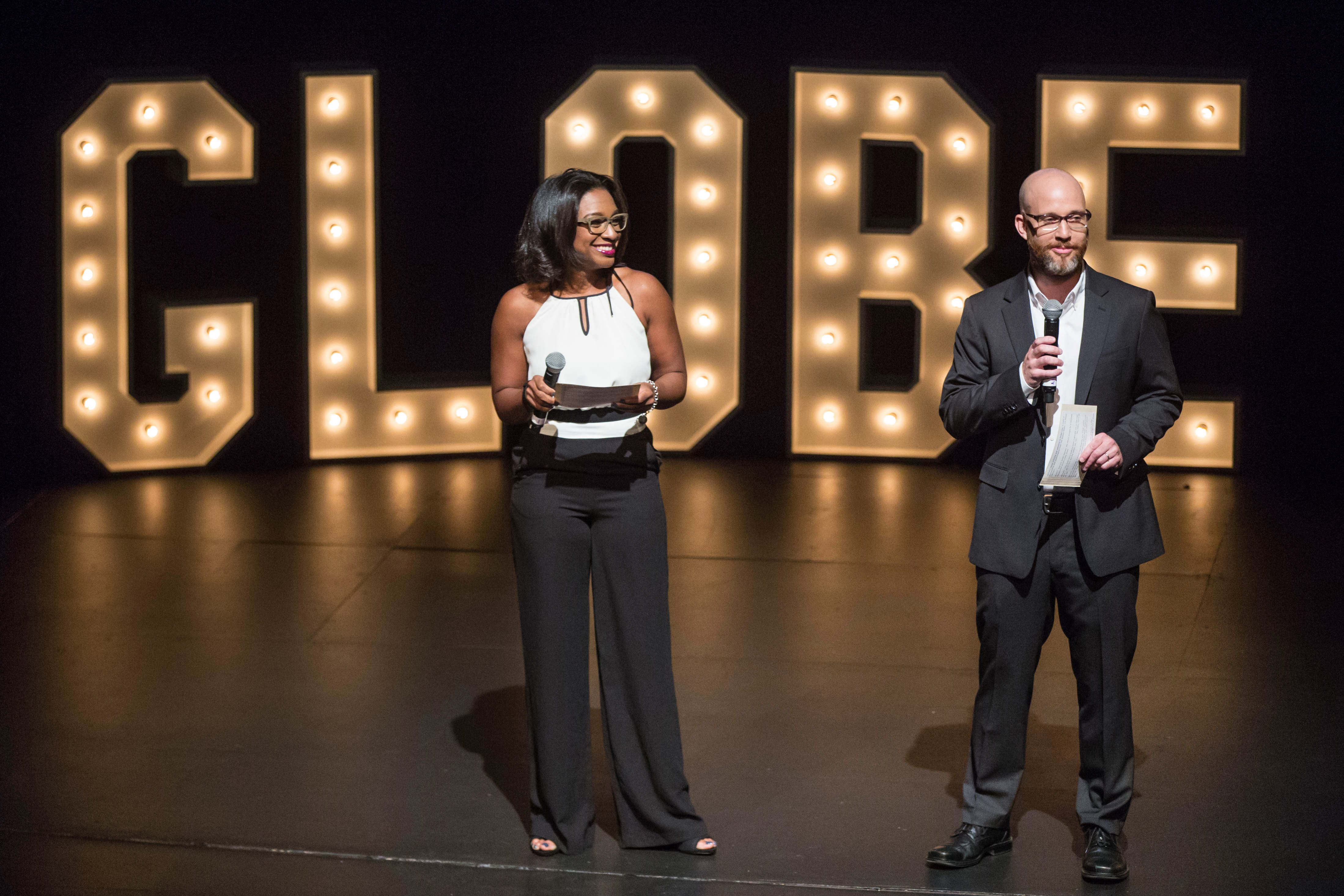 “Globe Live” hosts Akilah Johnson and Scott Helman onstage.