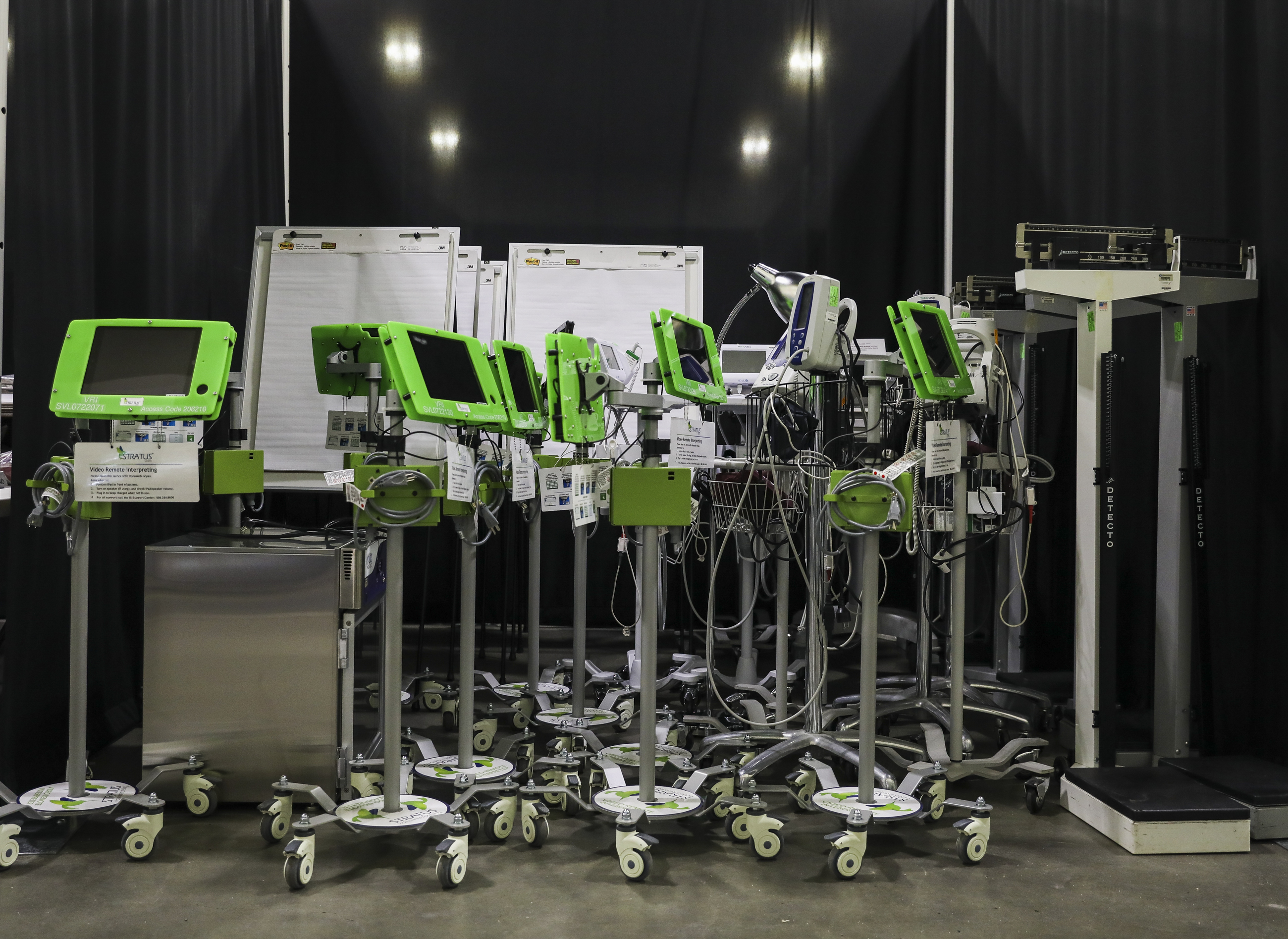 Translation equipment, EKGs and blood pressure monitors waited to be used in the field hospital at the DCU Center in Worcester.