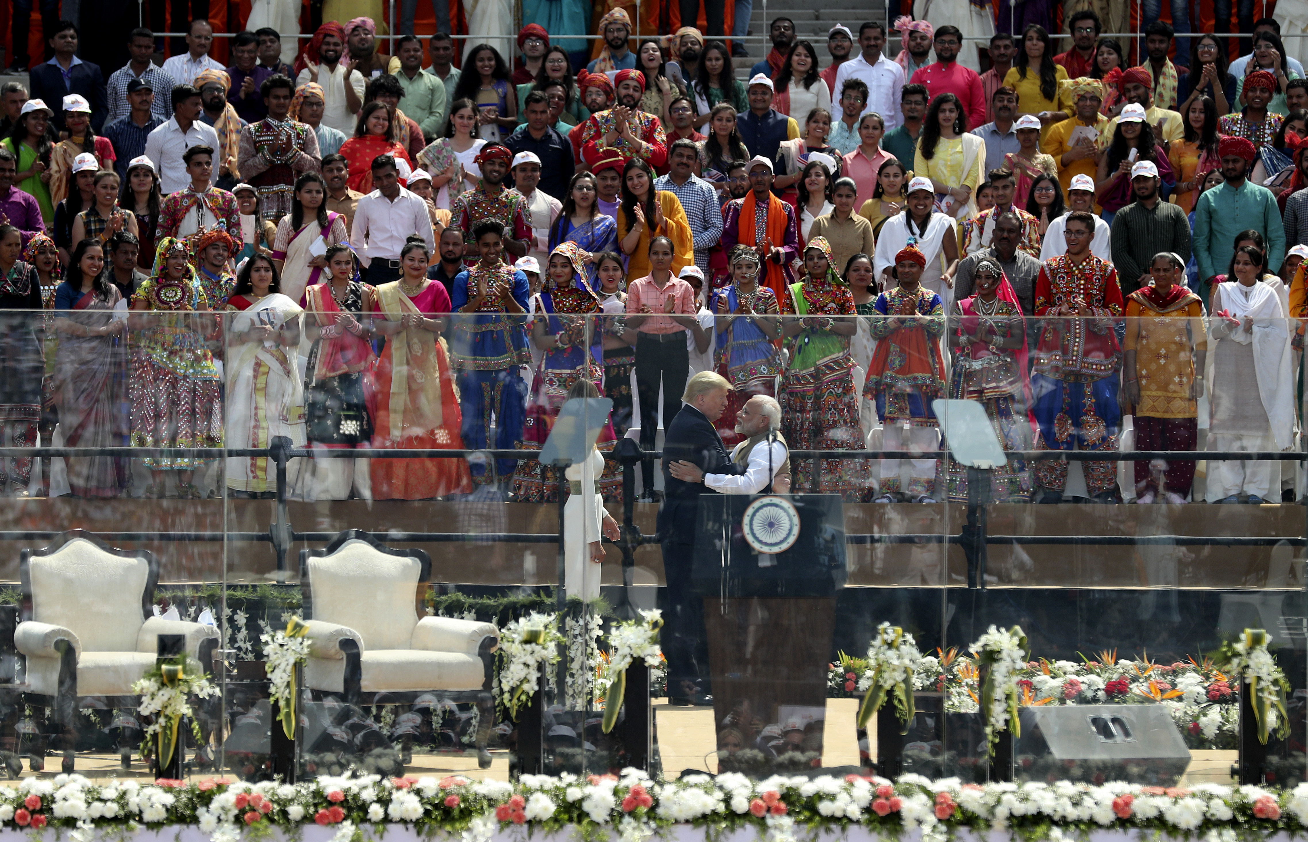 The crowd watched US President Donald Trump and Indian Prime Minister Narendra Modi hug each other after they arrived to attend the 'Namaste Trump' event.