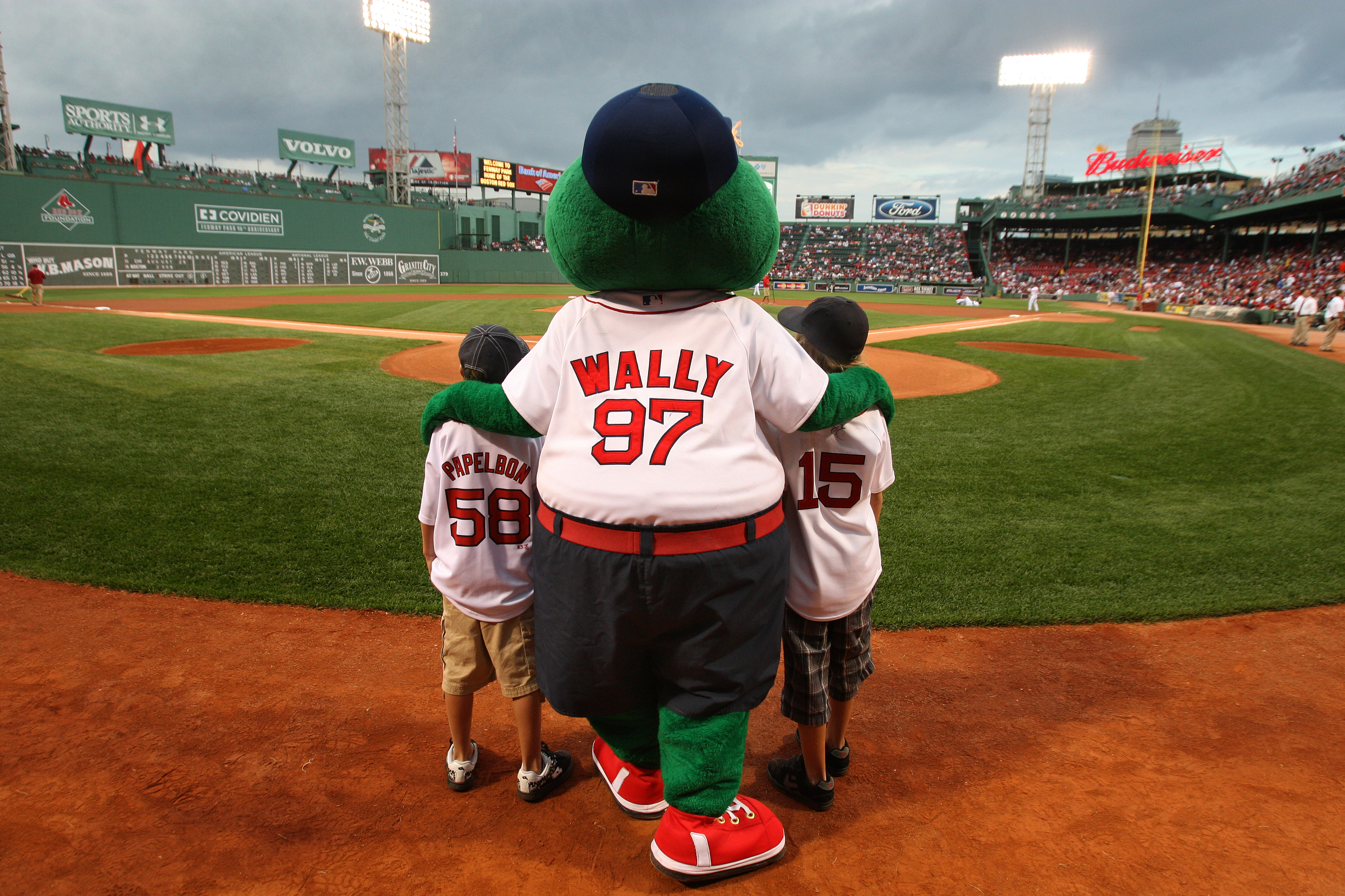 Weston Taylor, left and Mason Taylor, of Eagle Mountain, Utah, served as honorary batboys on Sept. 4, 2008, about two months after their father died in a medical helicopter collision before fulfilling his promise of taking them to Fenway Park.