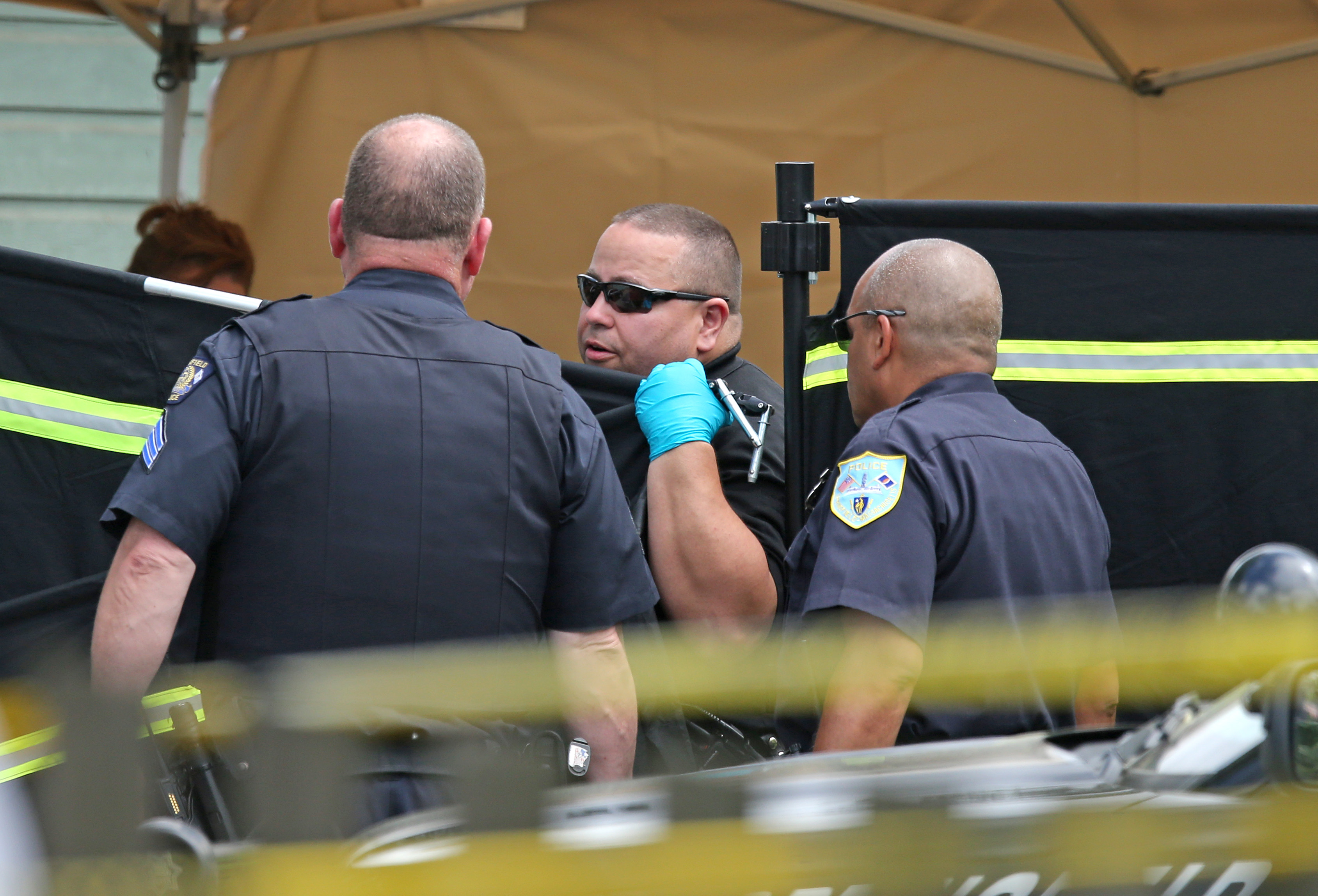 Springfield police prepared to remove a body.
