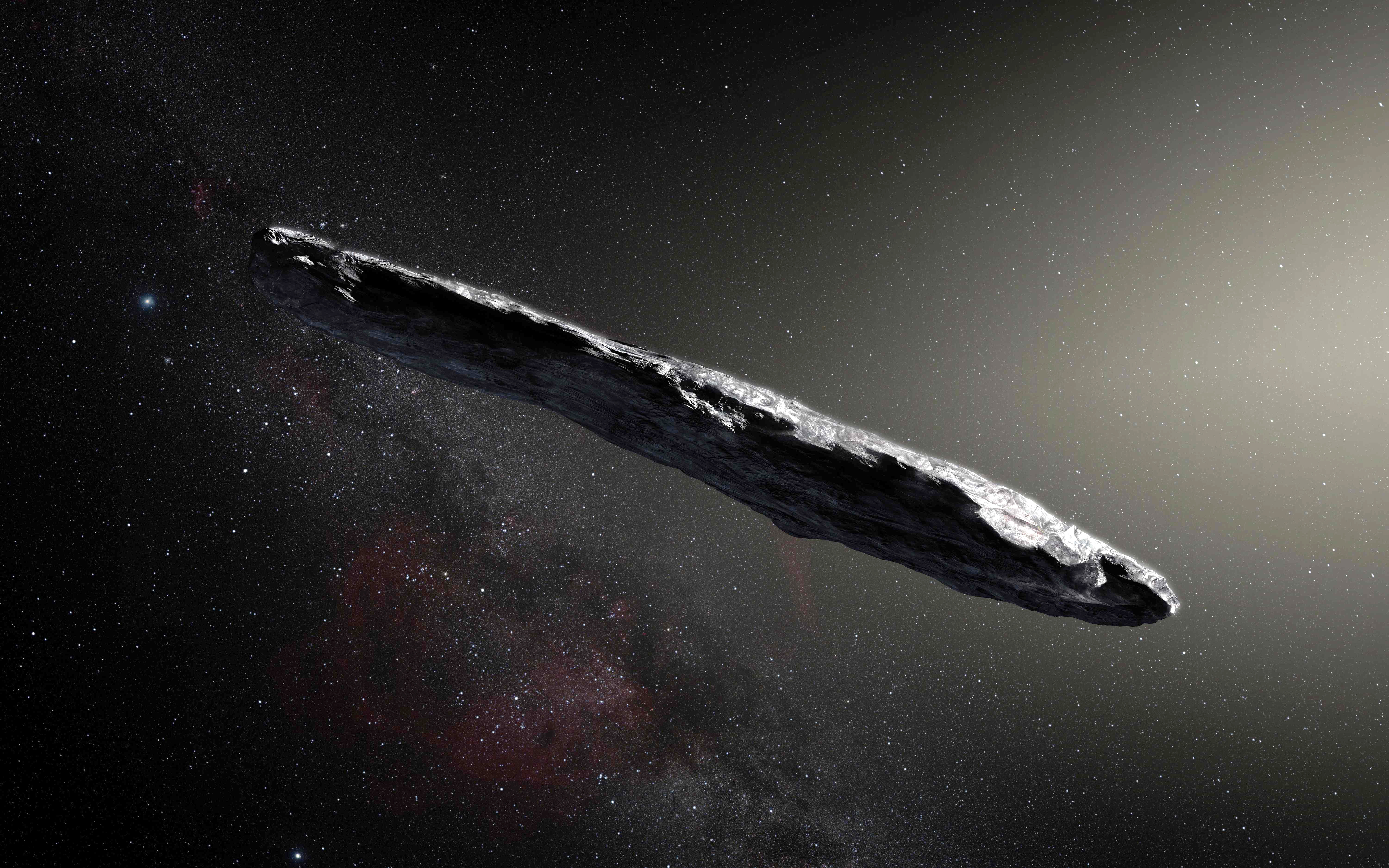 This photo released by the European Southern Observatory on Nov. 20, 2017, shows an artist's impression of the first interstellar asteroid: ‘Oumuamua.