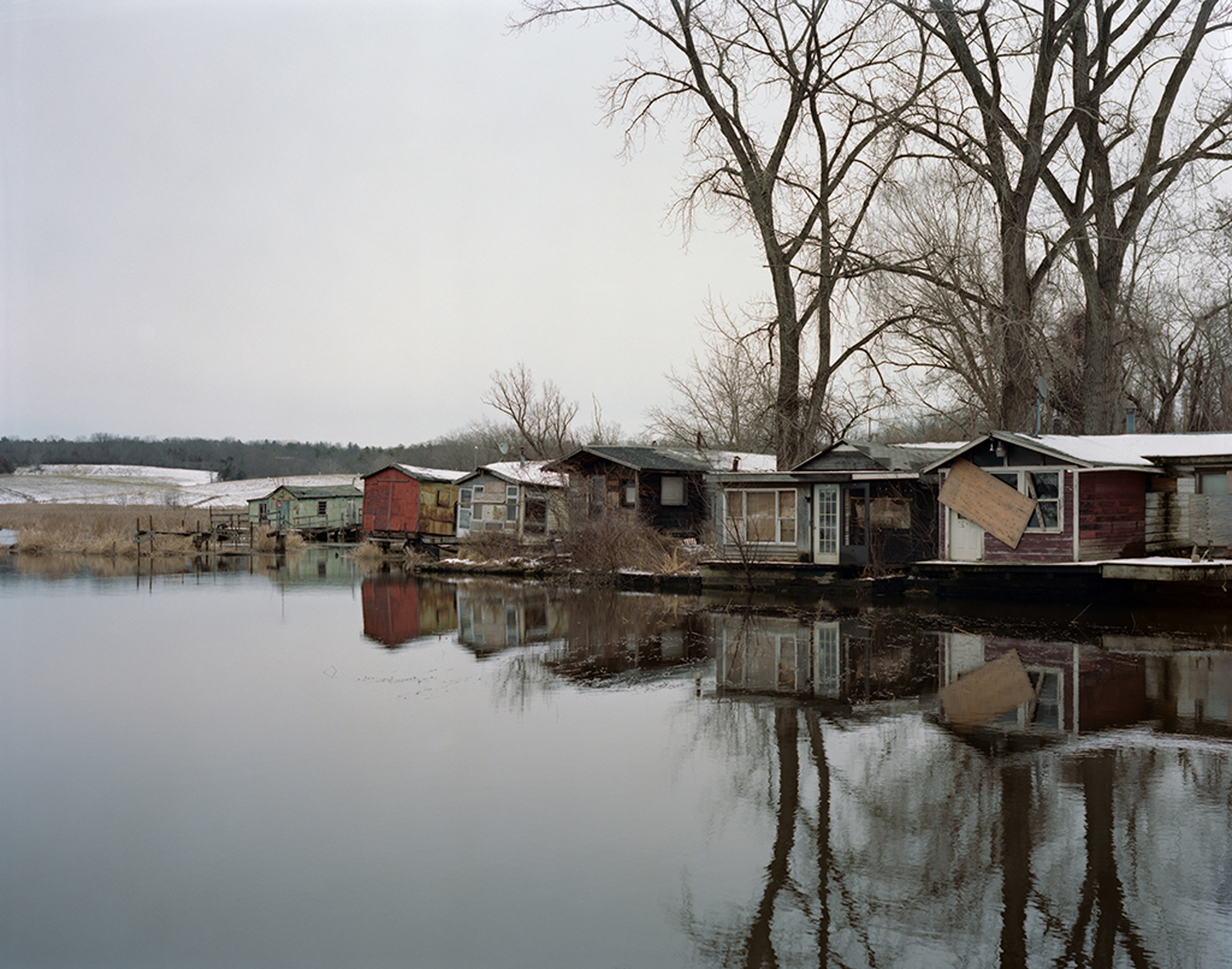 Tema Stauffer’s “Fishing Shacks, Hudson, New York.”