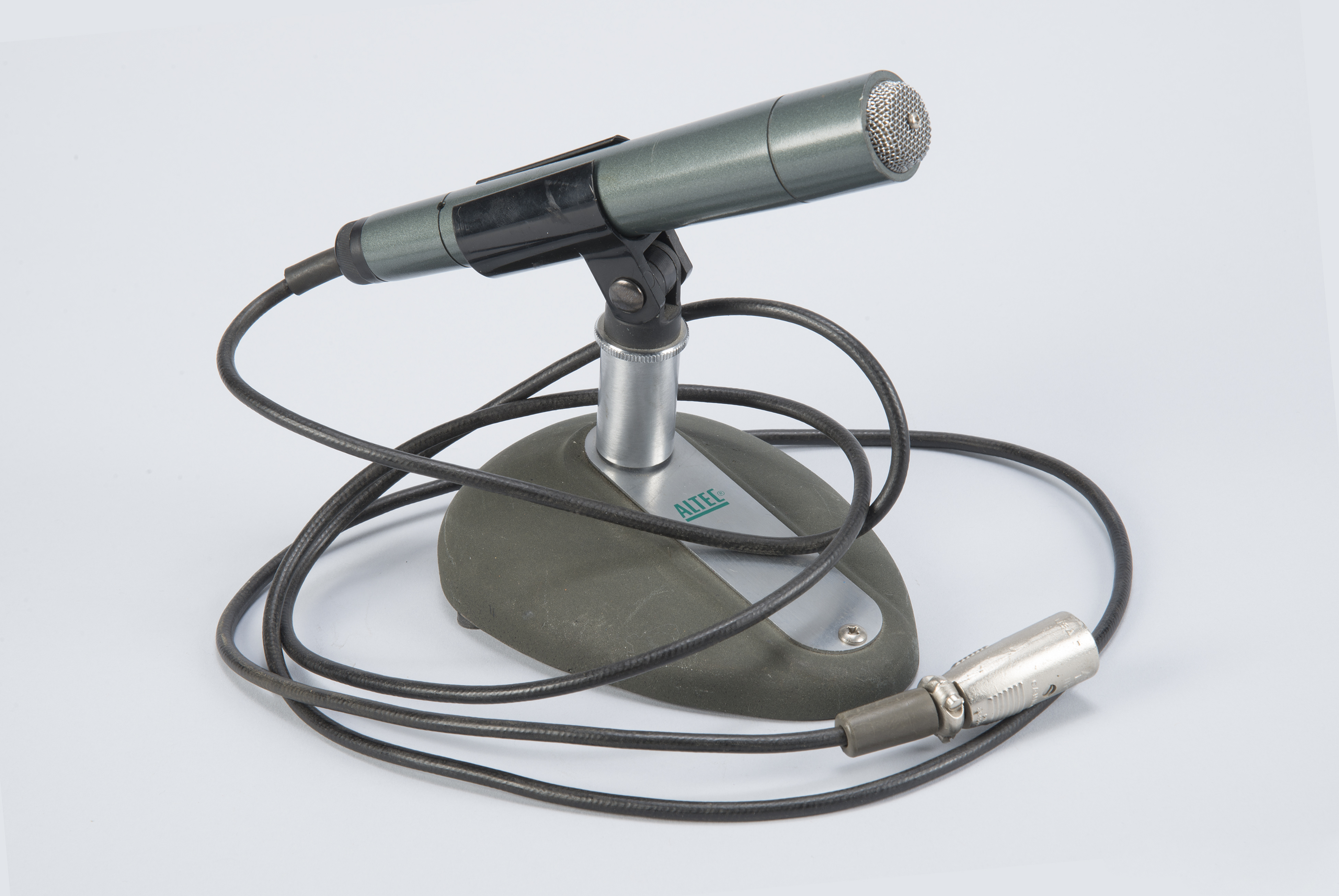 An Altec microphone is part of the exhibit.