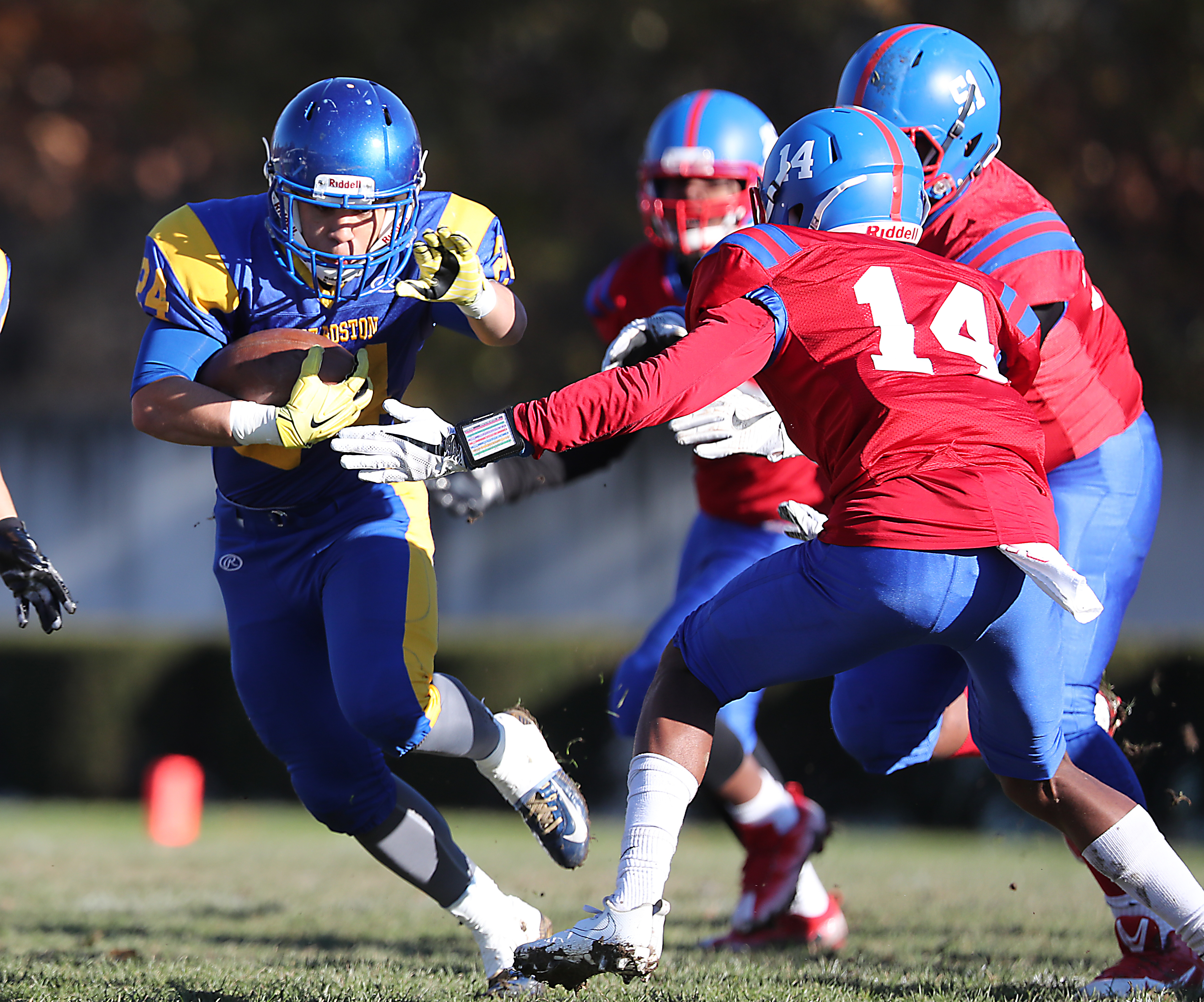 East Boston’s Angelo Blake puts a move a pair of South Boston defenders.