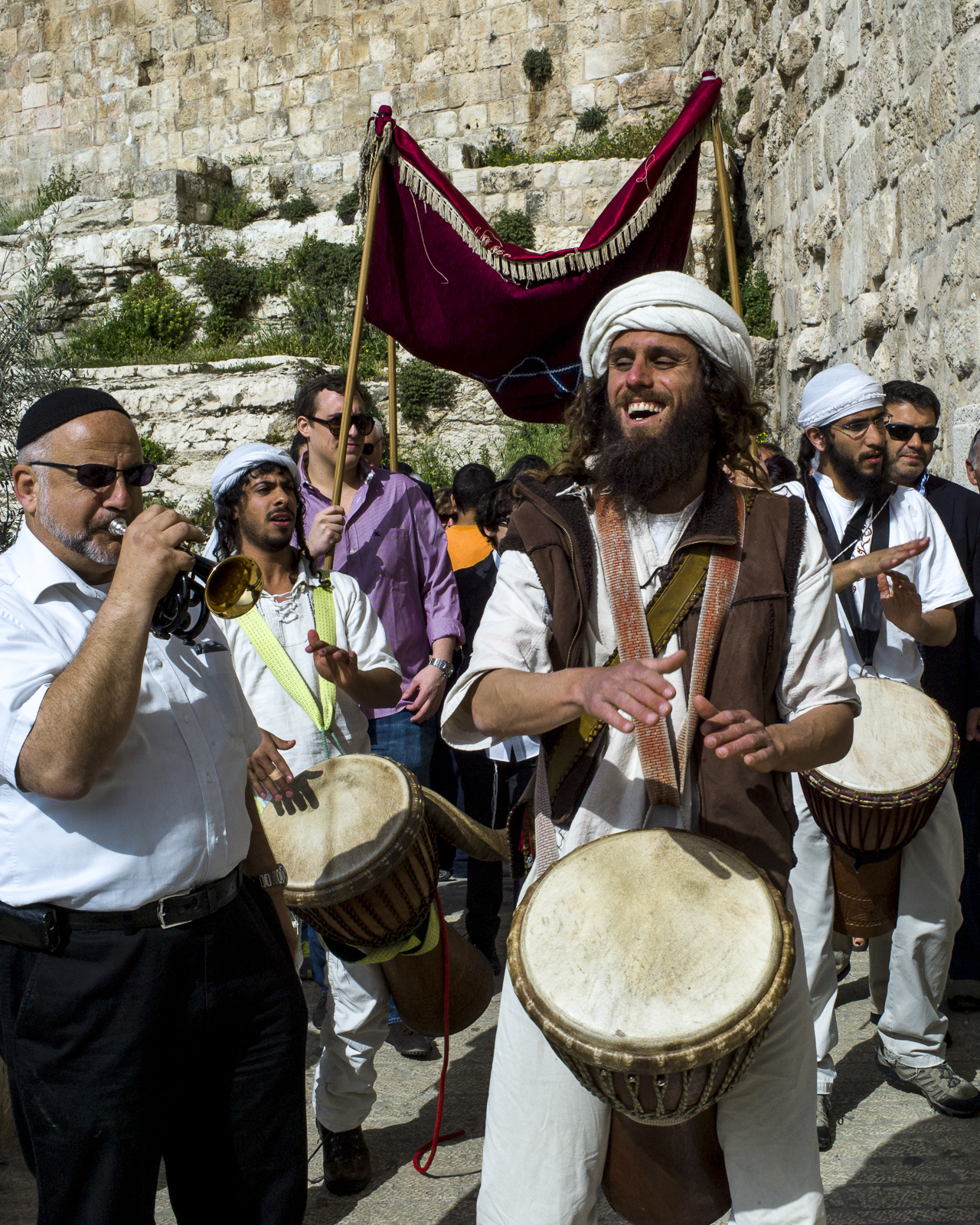 Musicians lead a Bar Mitzvah boy toward the Western Wall in “Jerusalem.”