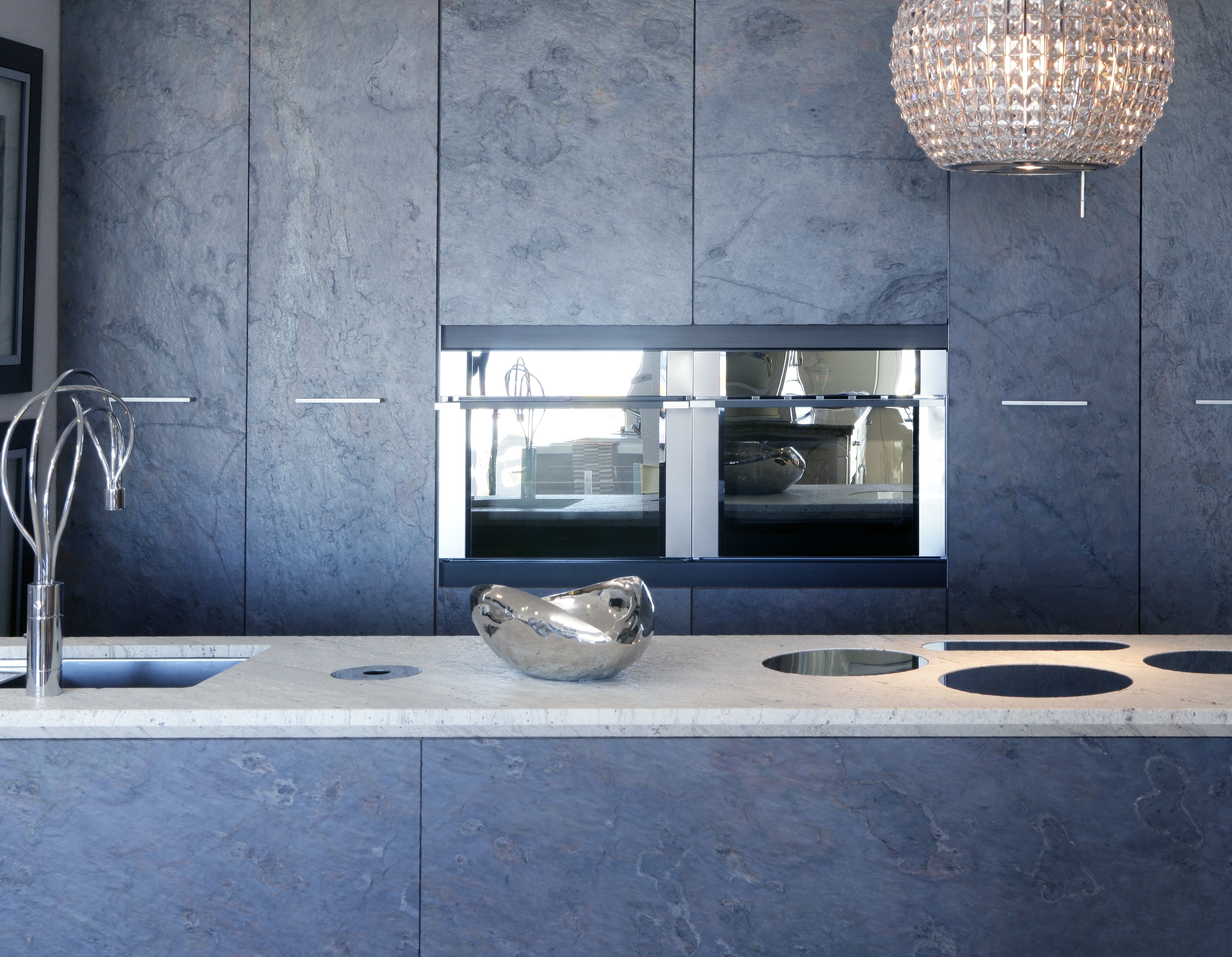 One reason quartz is so popular is that it can look an awful lot like white marble, without being as finicky.