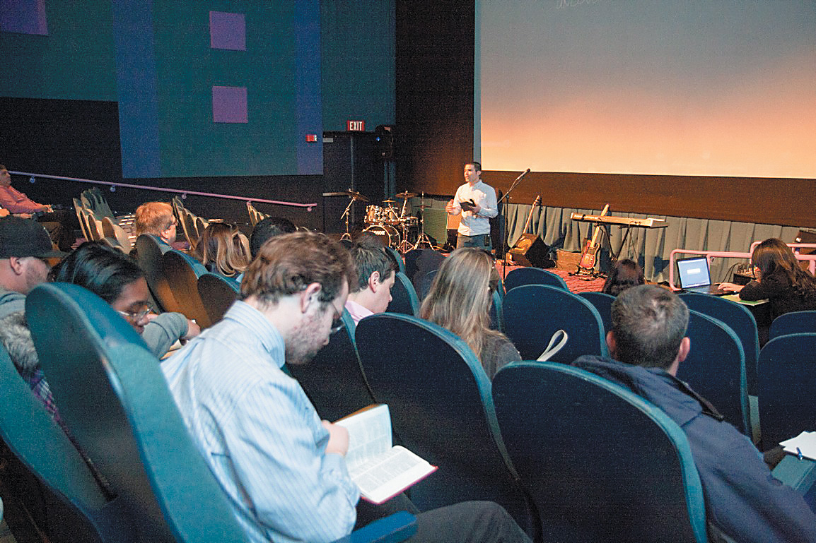 Allison, a 27-year-old evangelical Christian, delivers his new church’s first sermon at a Revere movie theater on Easter Sunday.