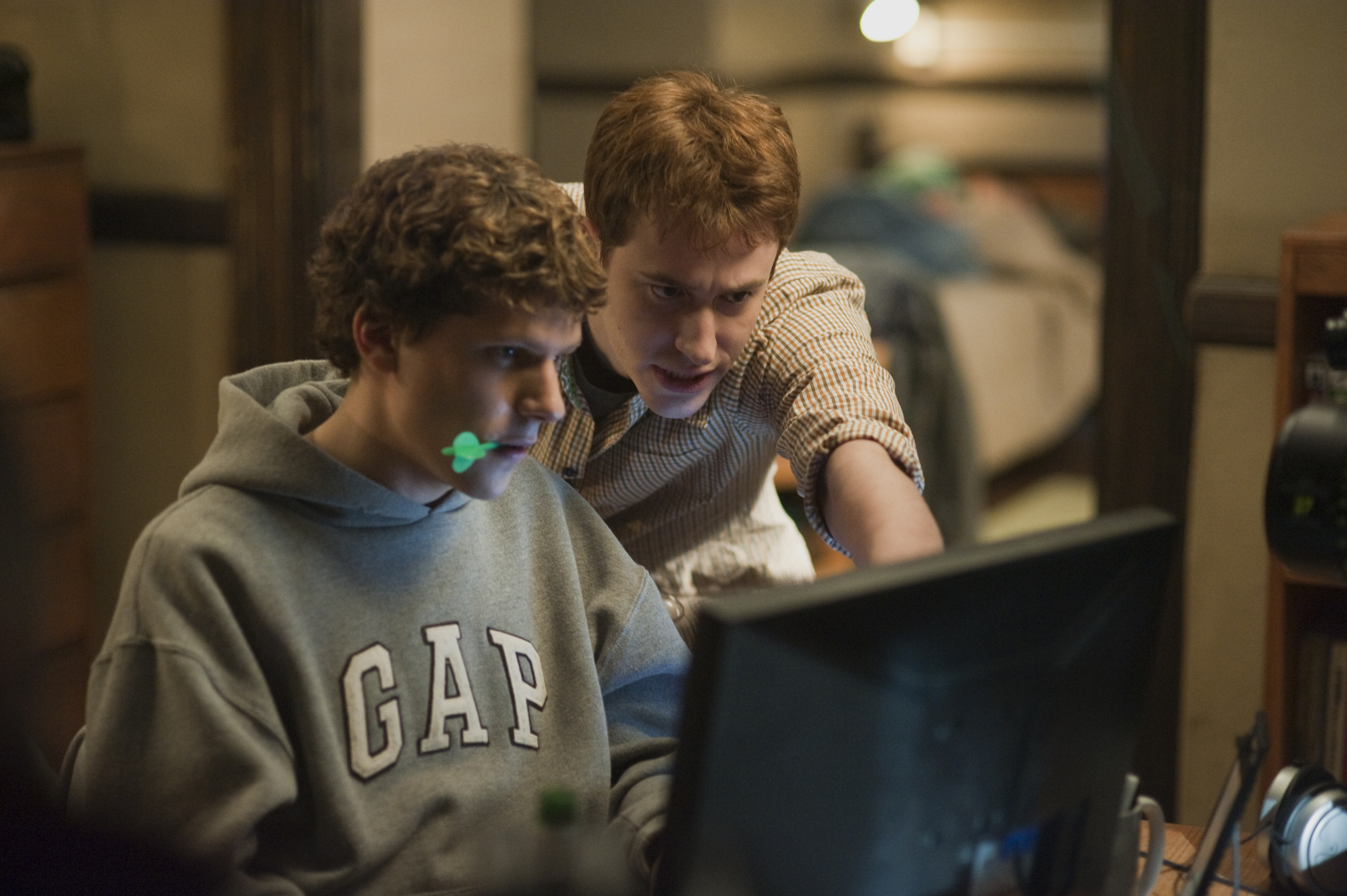 Jesse Eisenberg (left) and Joseph Mazzello in "The Social Network."