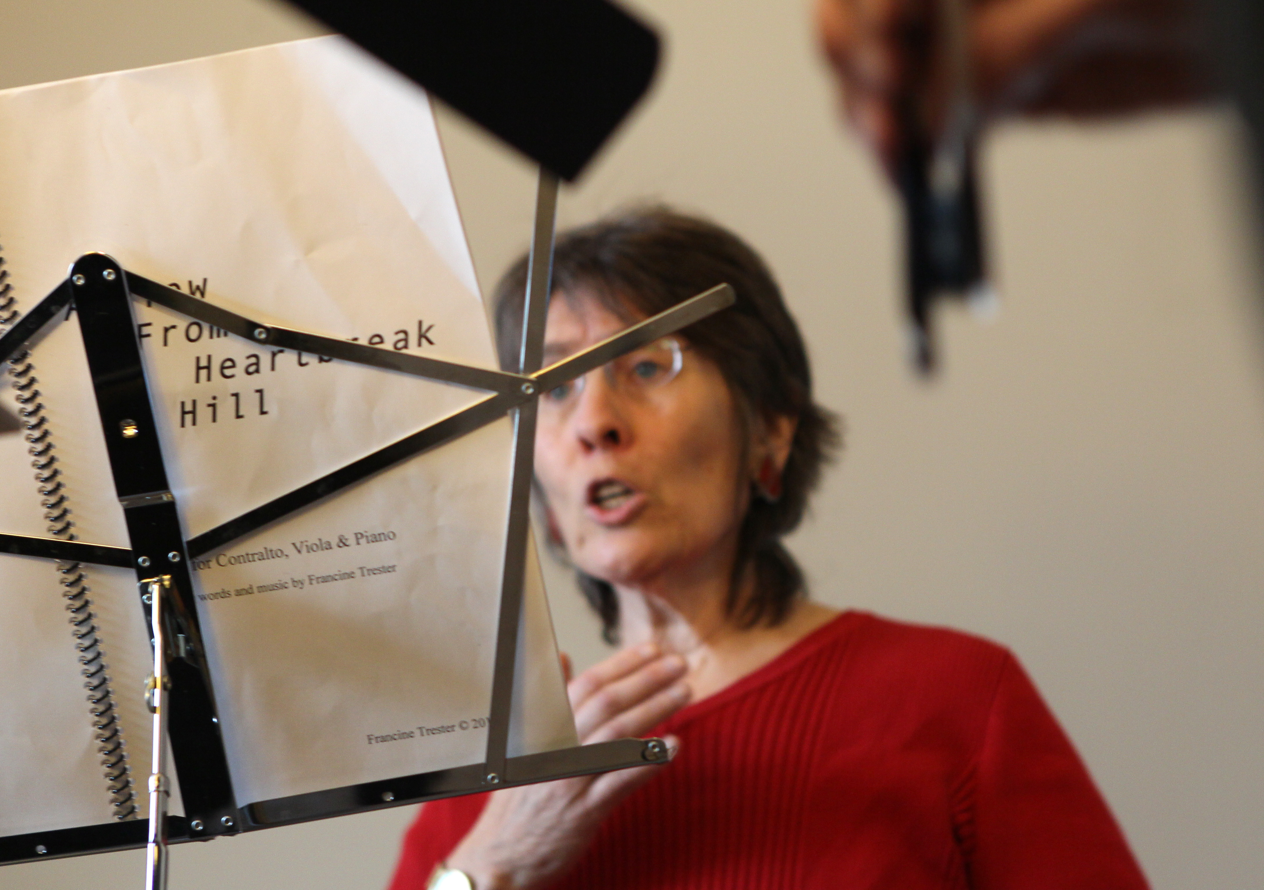 Elizabeth Anker sings during a rehearsal.