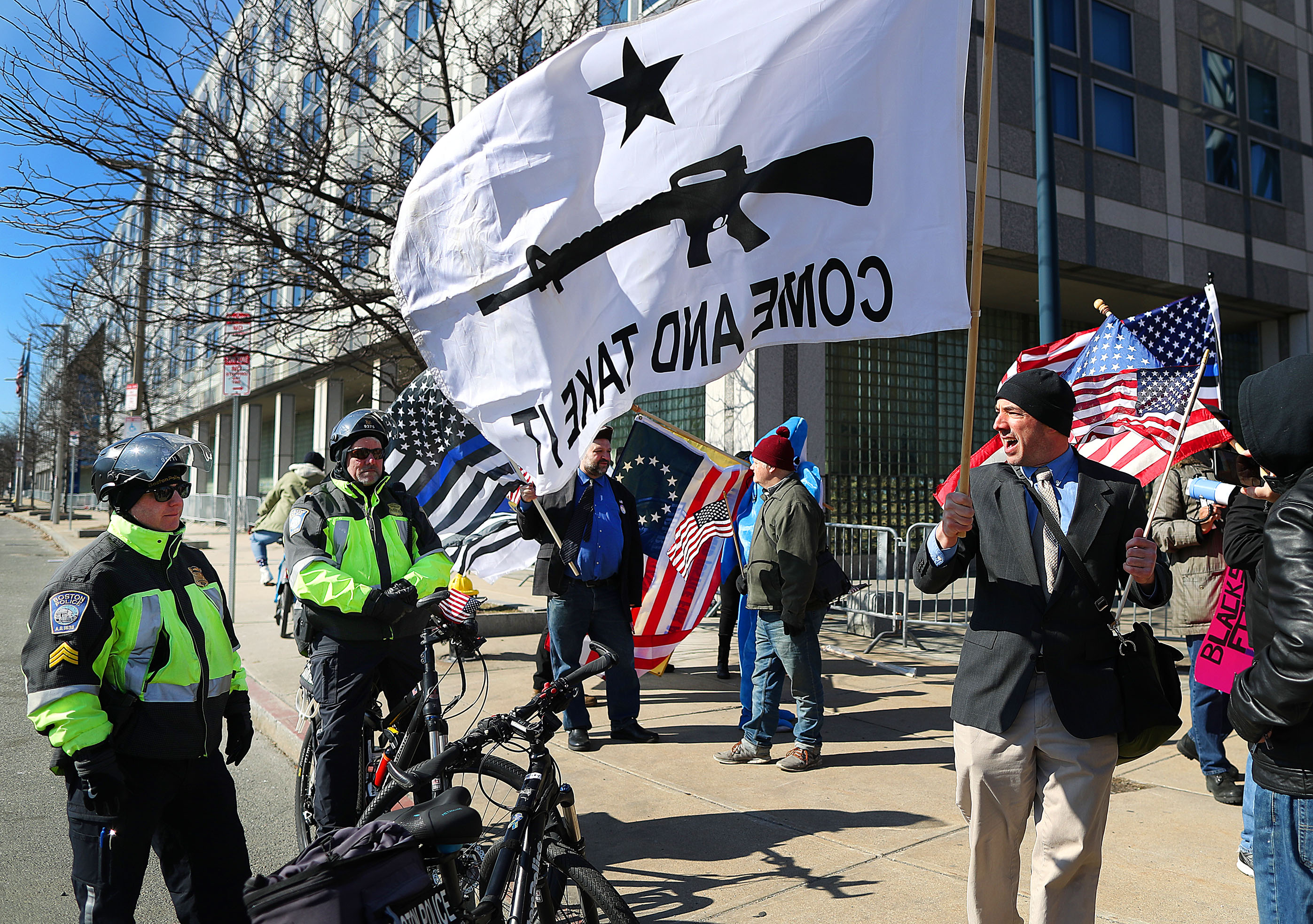 Police stood between the Super Happy Fun America people and counter protestors.