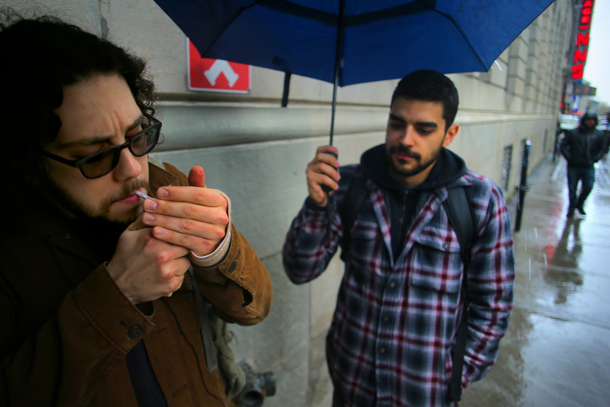 Michael Rolli (left) and friend Zachary Raposo shared a joint purchased at a government-run shop.