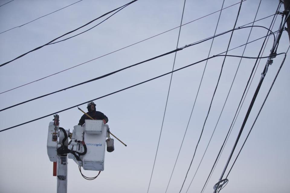 National Grid utility worker worked on a power line on Washington Steet in 2013.