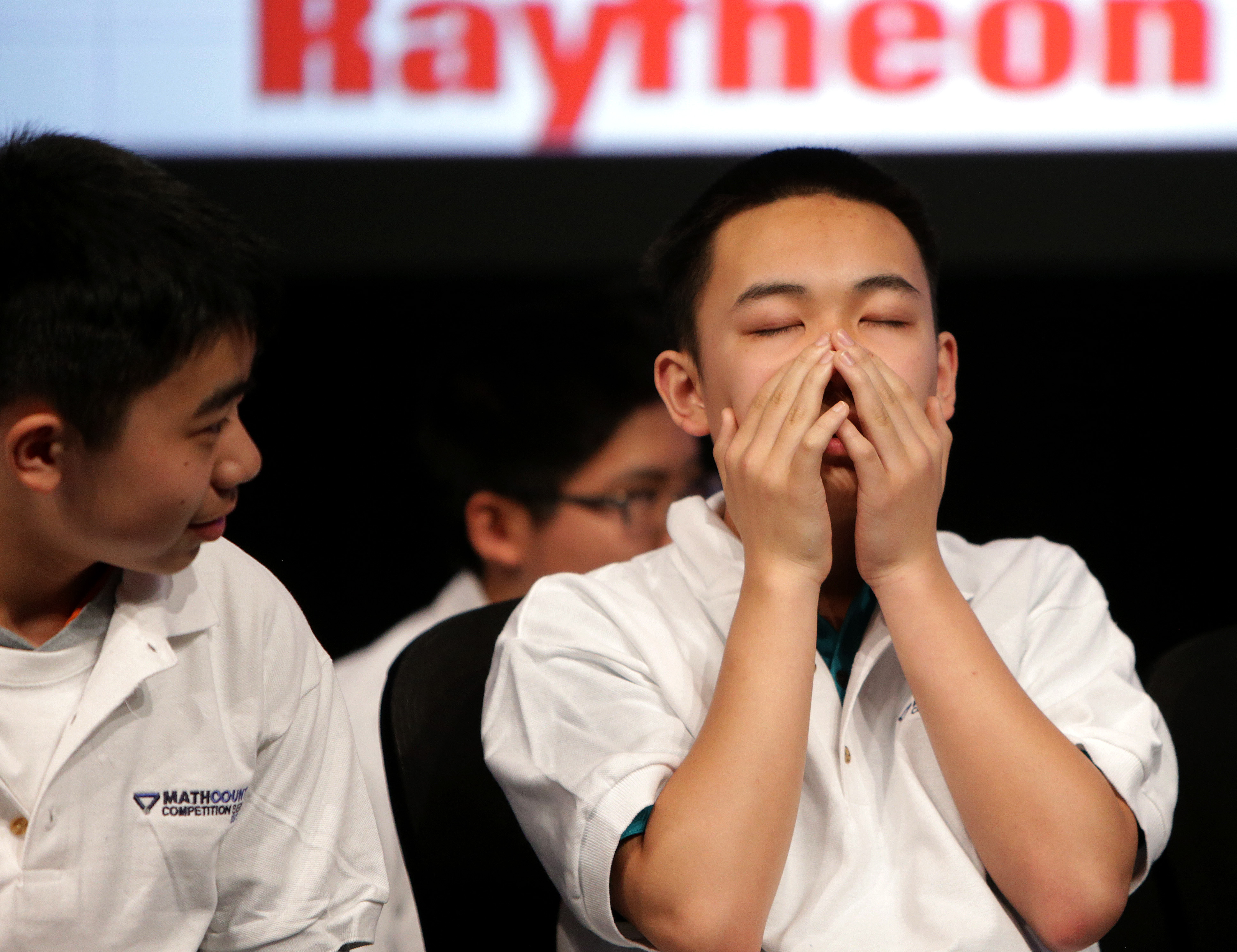 Colin Tang of Washington reacted to a question on the sidelines.