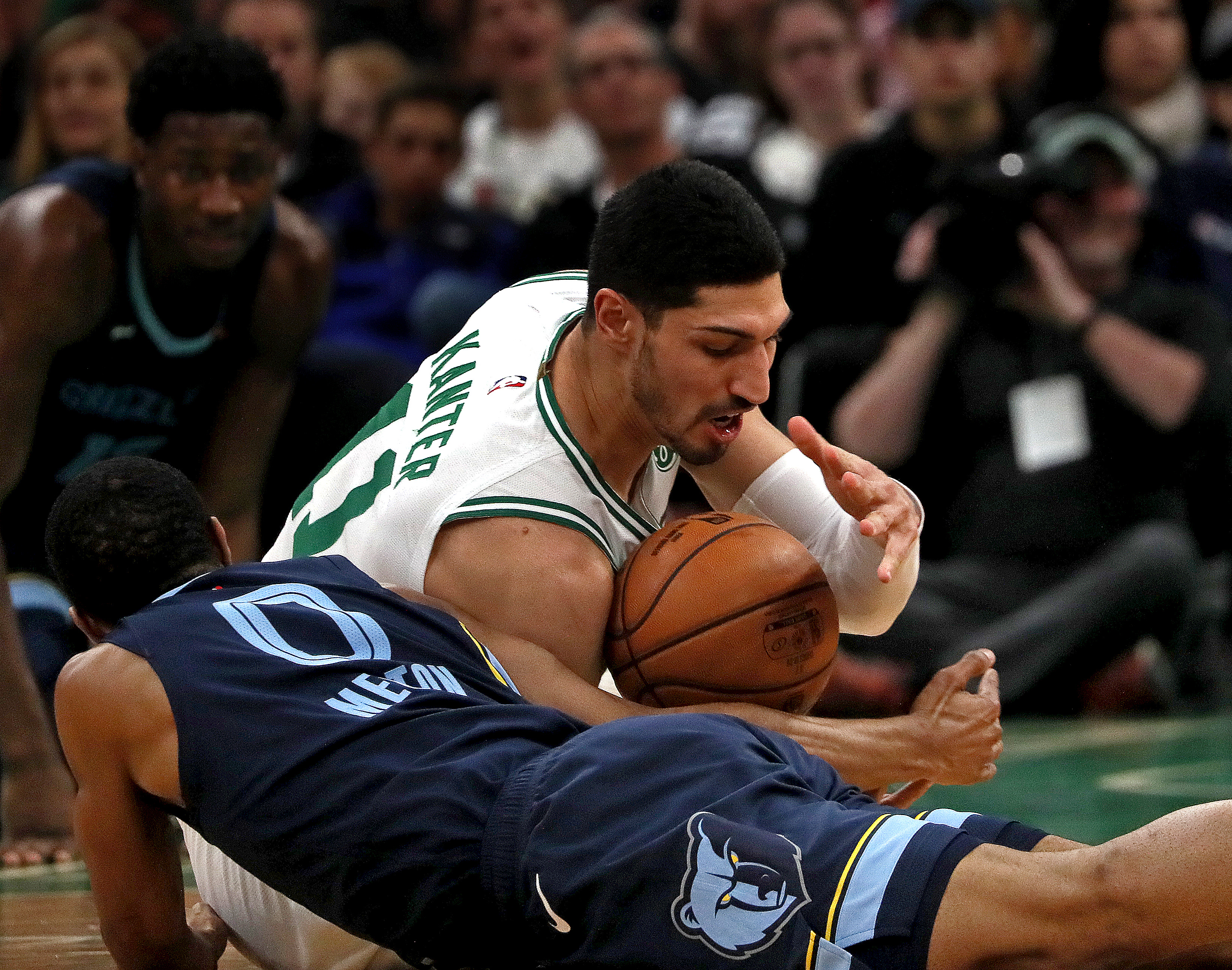 Enes Kanter fights for a loose ball with Memphis guard De'Anthony Melton in the third quarter of Wednesday’s game.