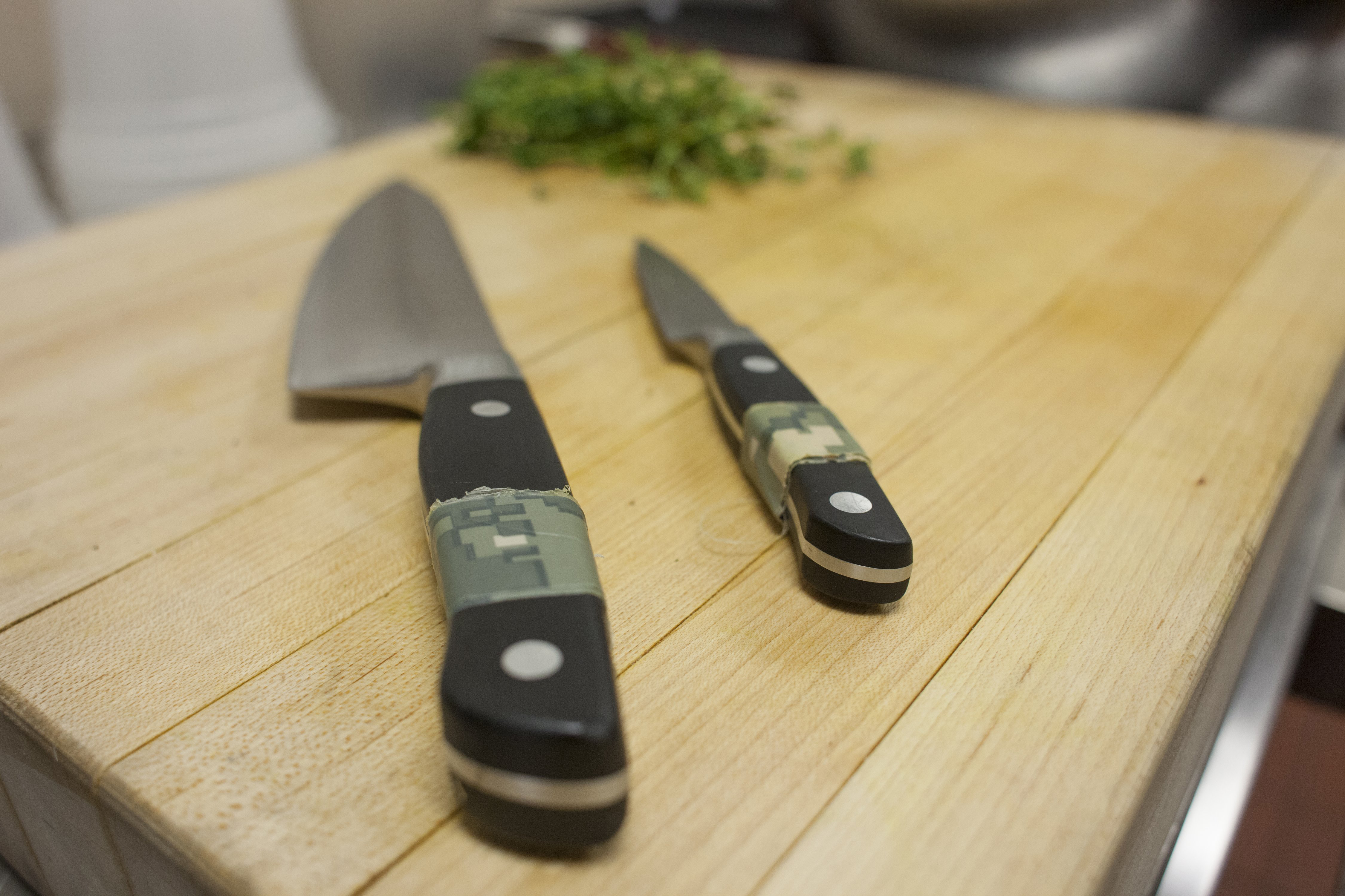 Gates' knives decorated in camouflage tape.