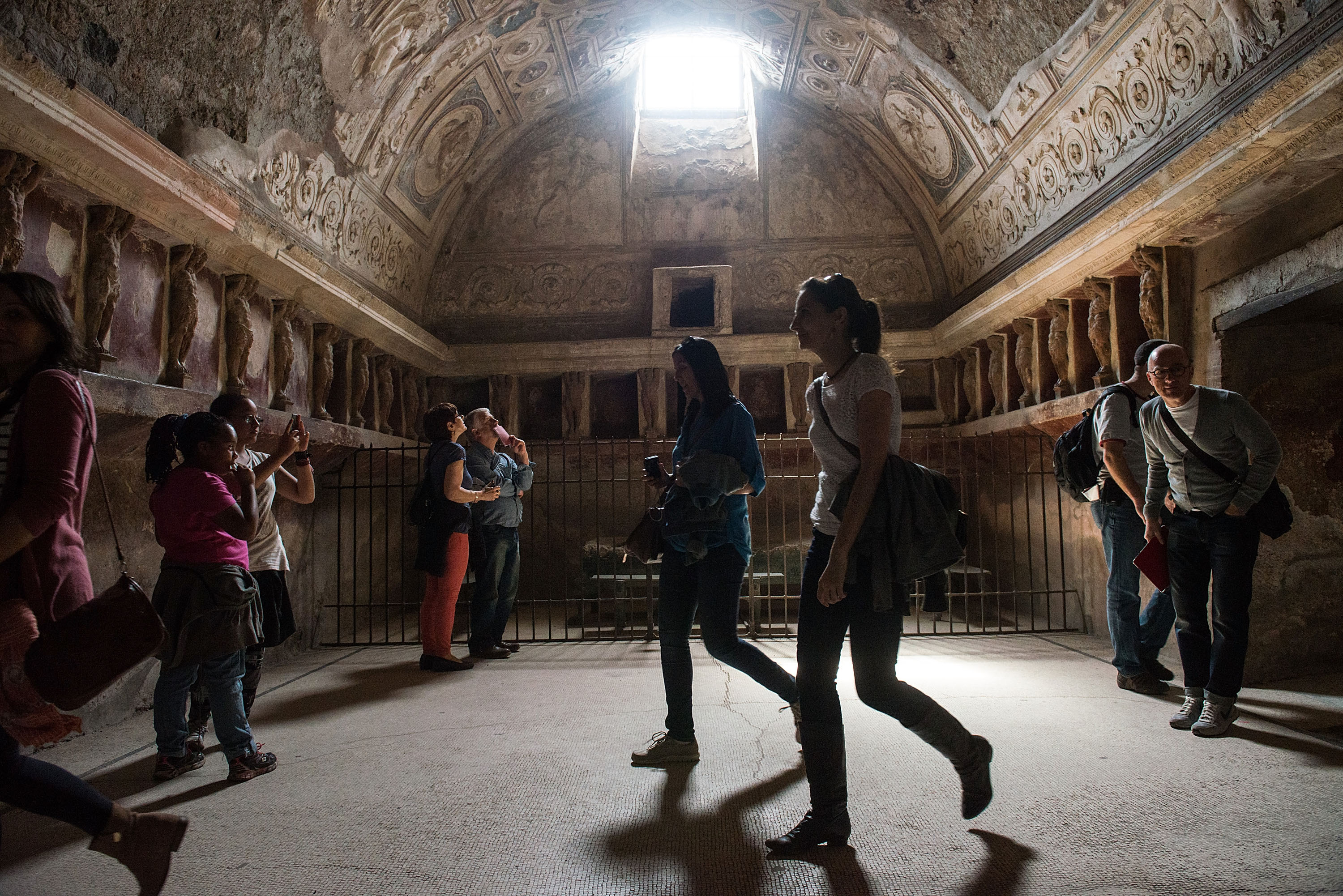 Tourists in the forum baths, in the city’s center.