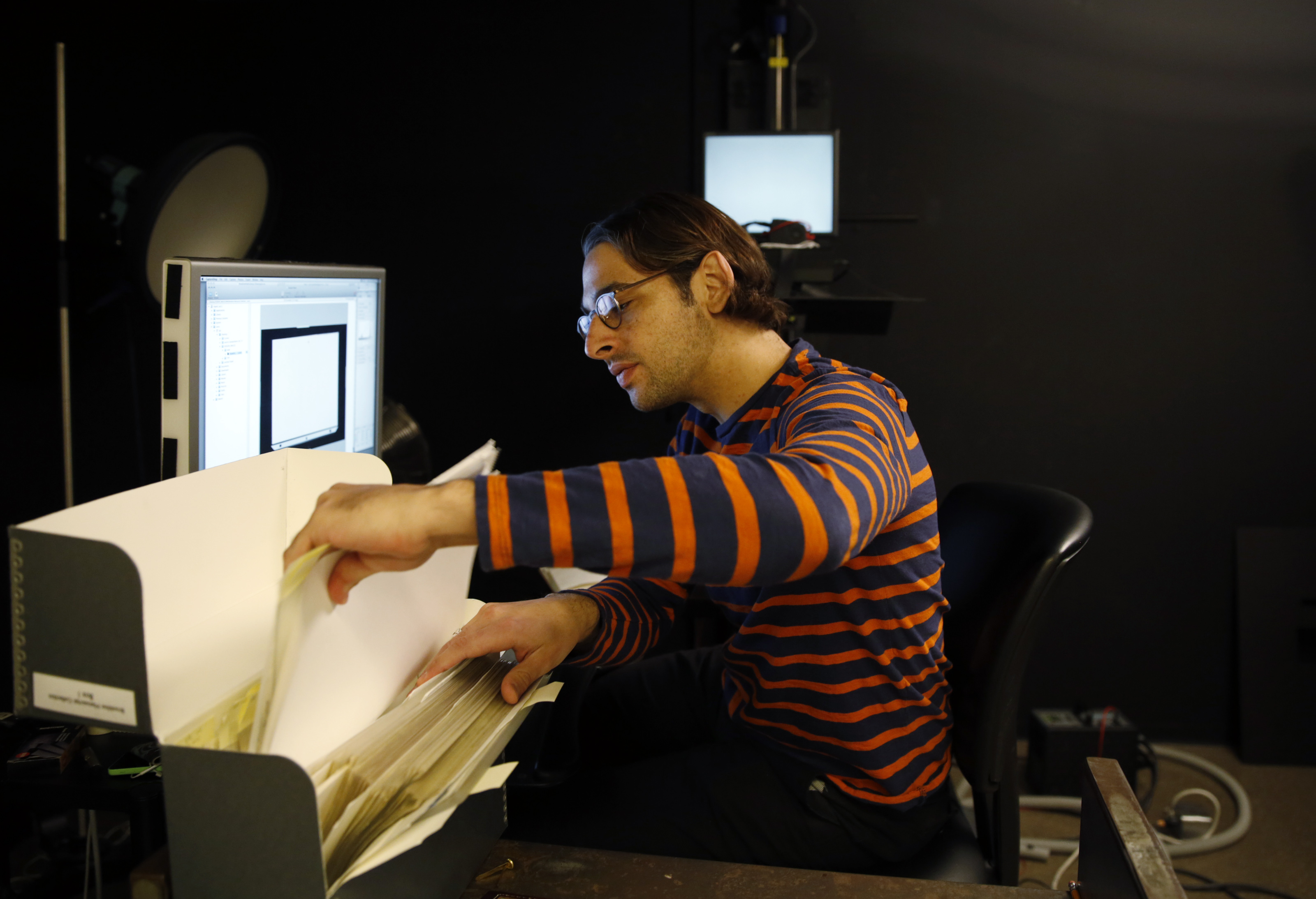 BPL Digital Imaging Production Assistant Justin Goodstein scanned a document from the Brookline Public Library.