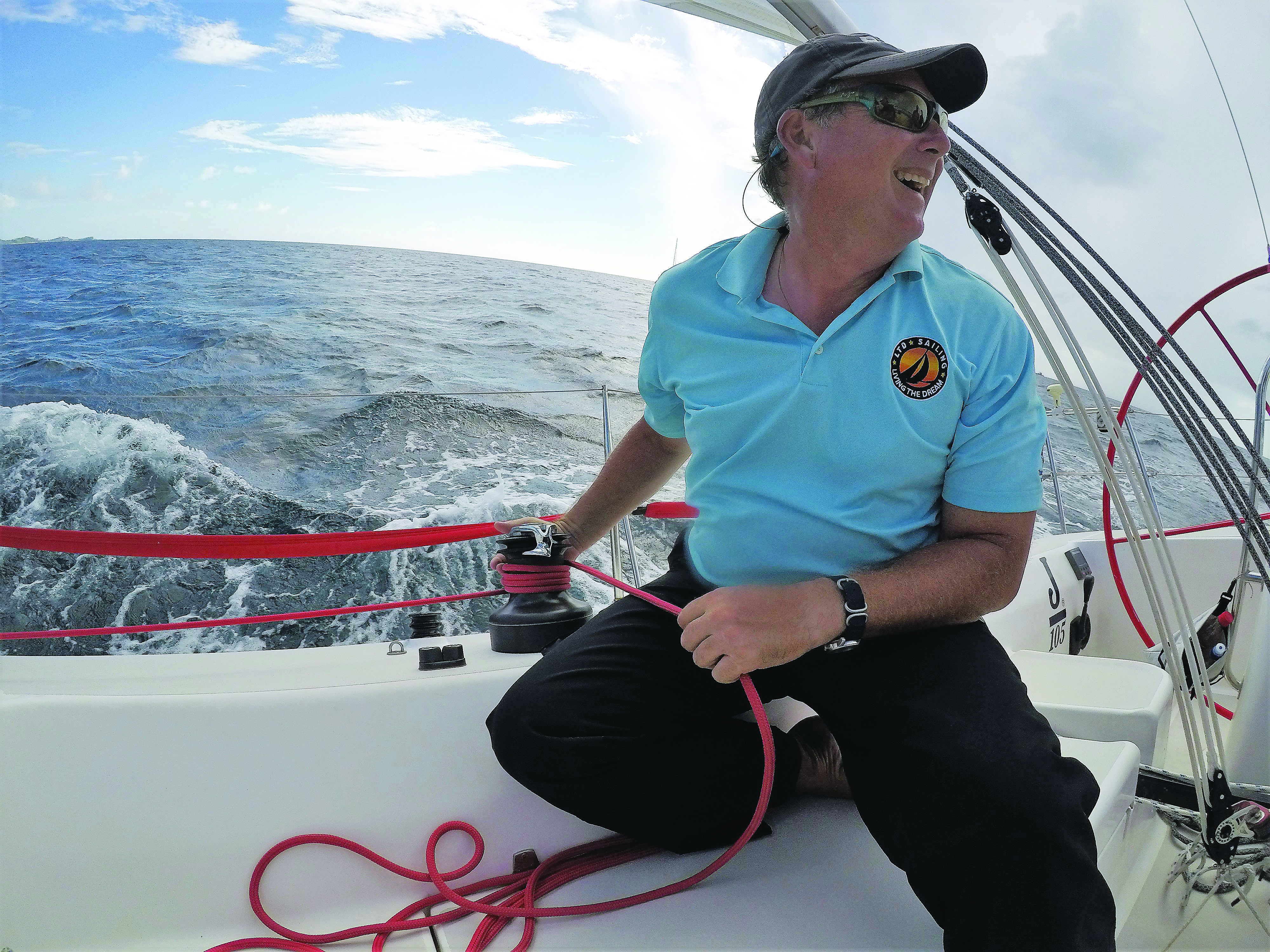 Chris Rundlett, an owner and founder of LTD Sailing, sails “Dogsmile,” a J/105. The fast, stable boat is good for teaching.