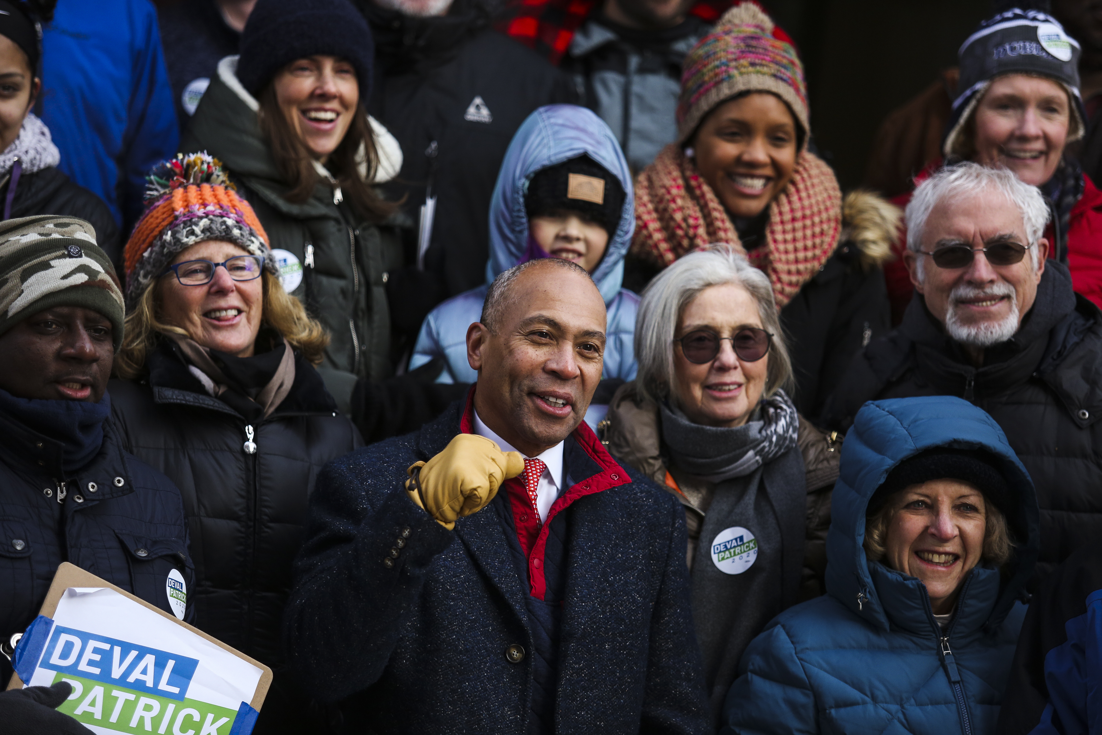 Democratic presidential candidate Deval Patrick joined campaign volunteers for a photograph during a stop in Manchester, N.H.